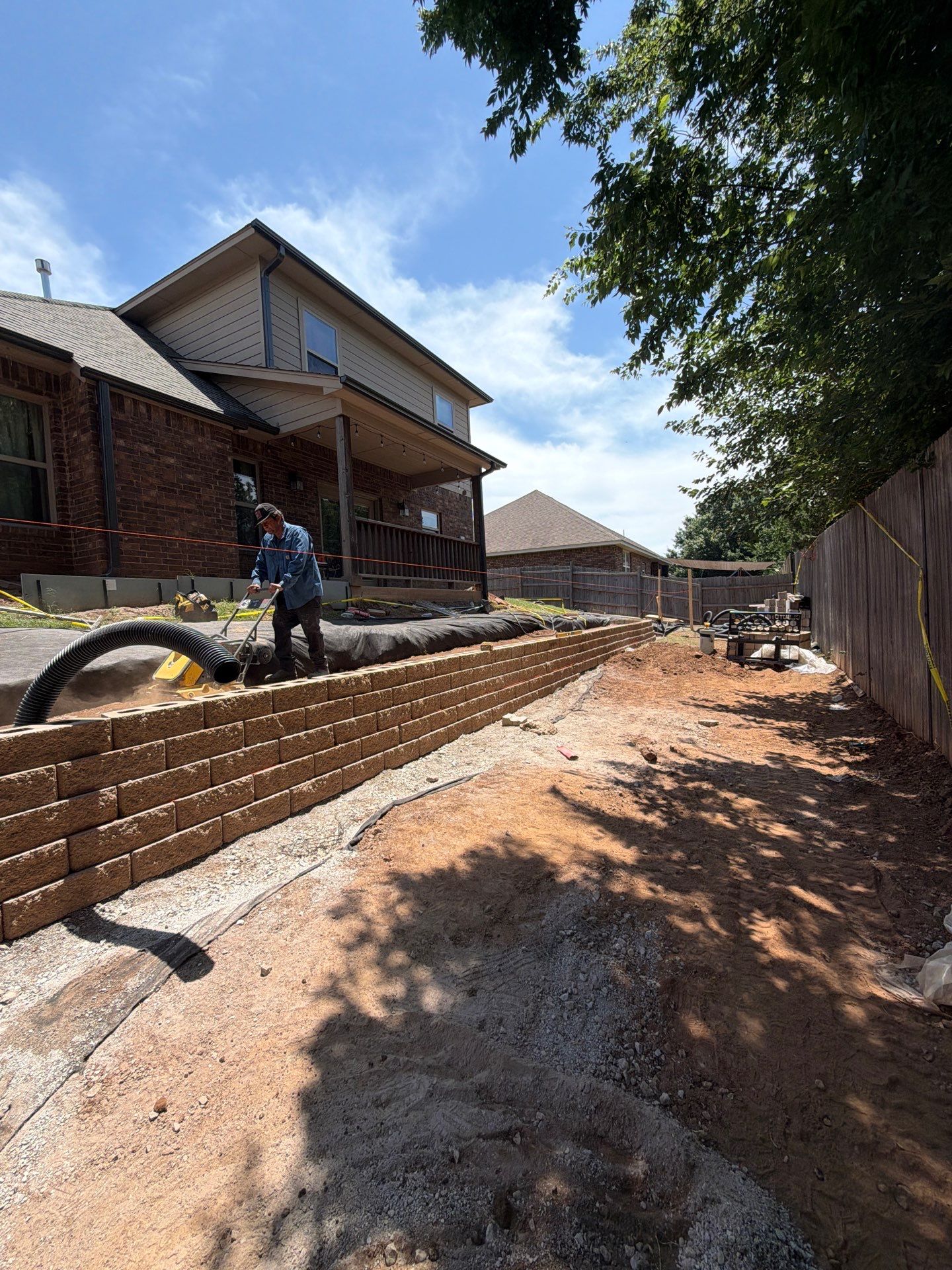 Custom Segmental Block Retaining Wall and Sod Installation in Lawton by Clays Services Inc