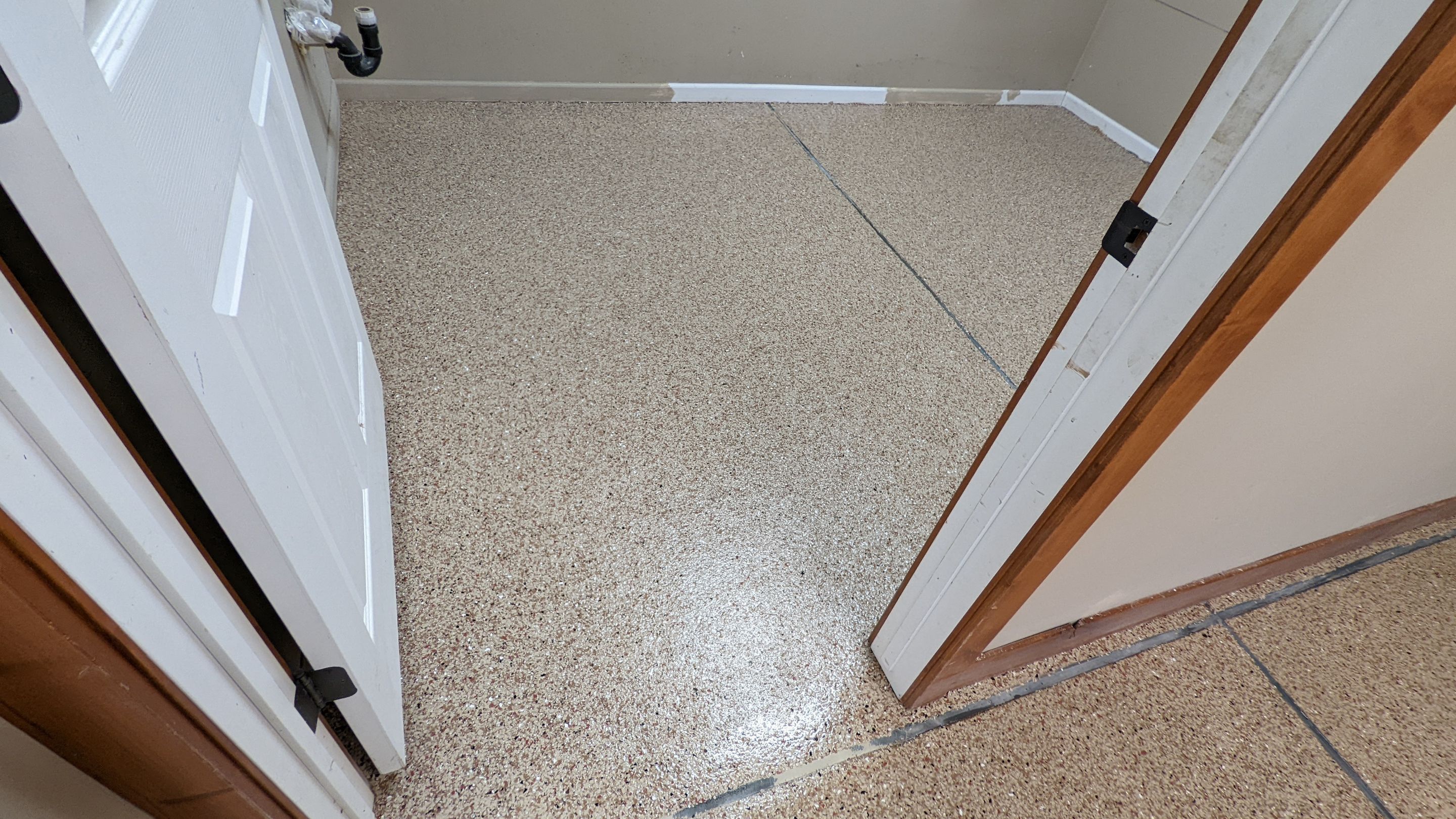 Garage Transformation using Sandstone by Croc Coatings, LLC