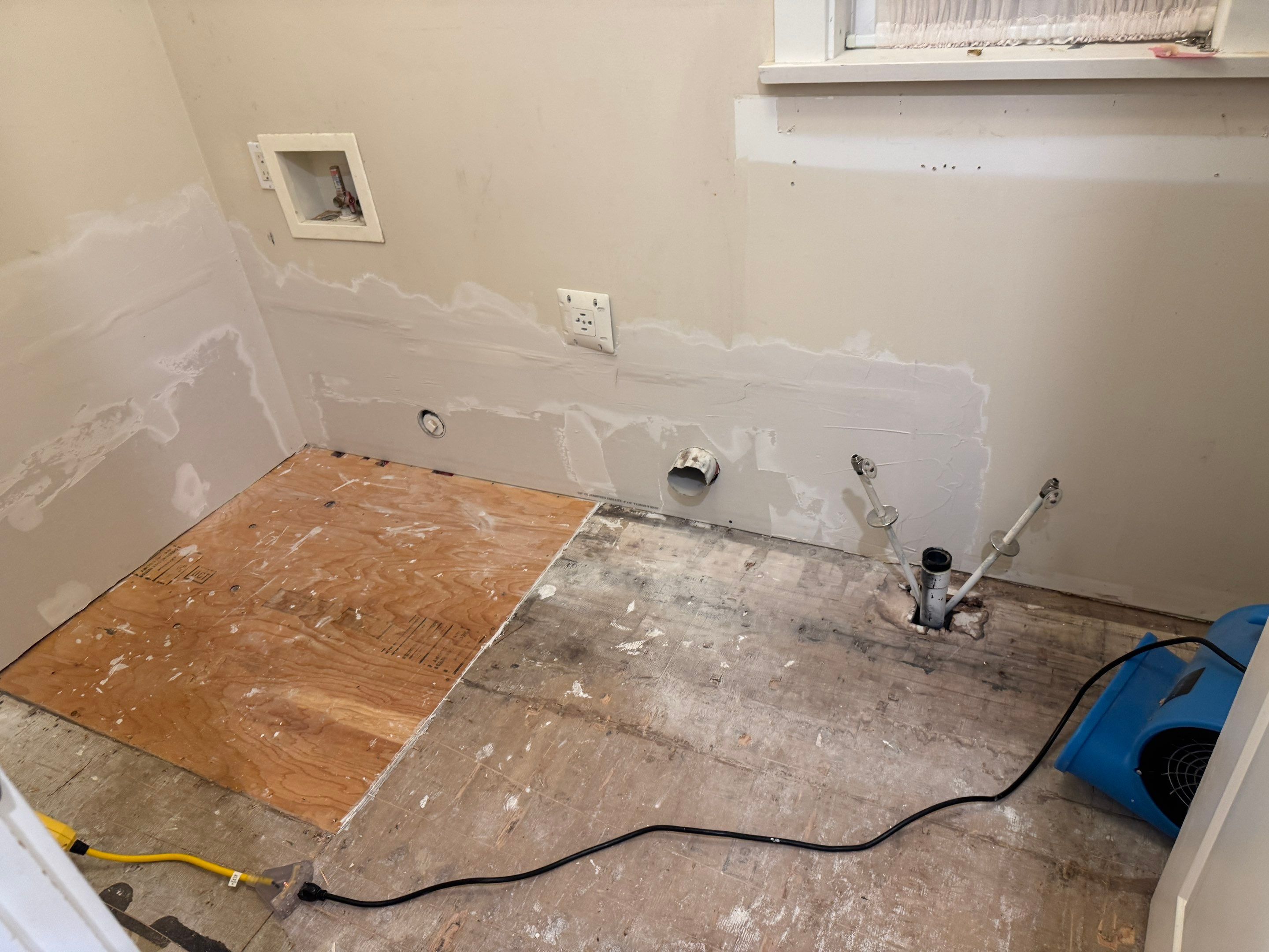 High-End Laundry Room Renovation and Restoration in Vancouver by YVR Construction Group