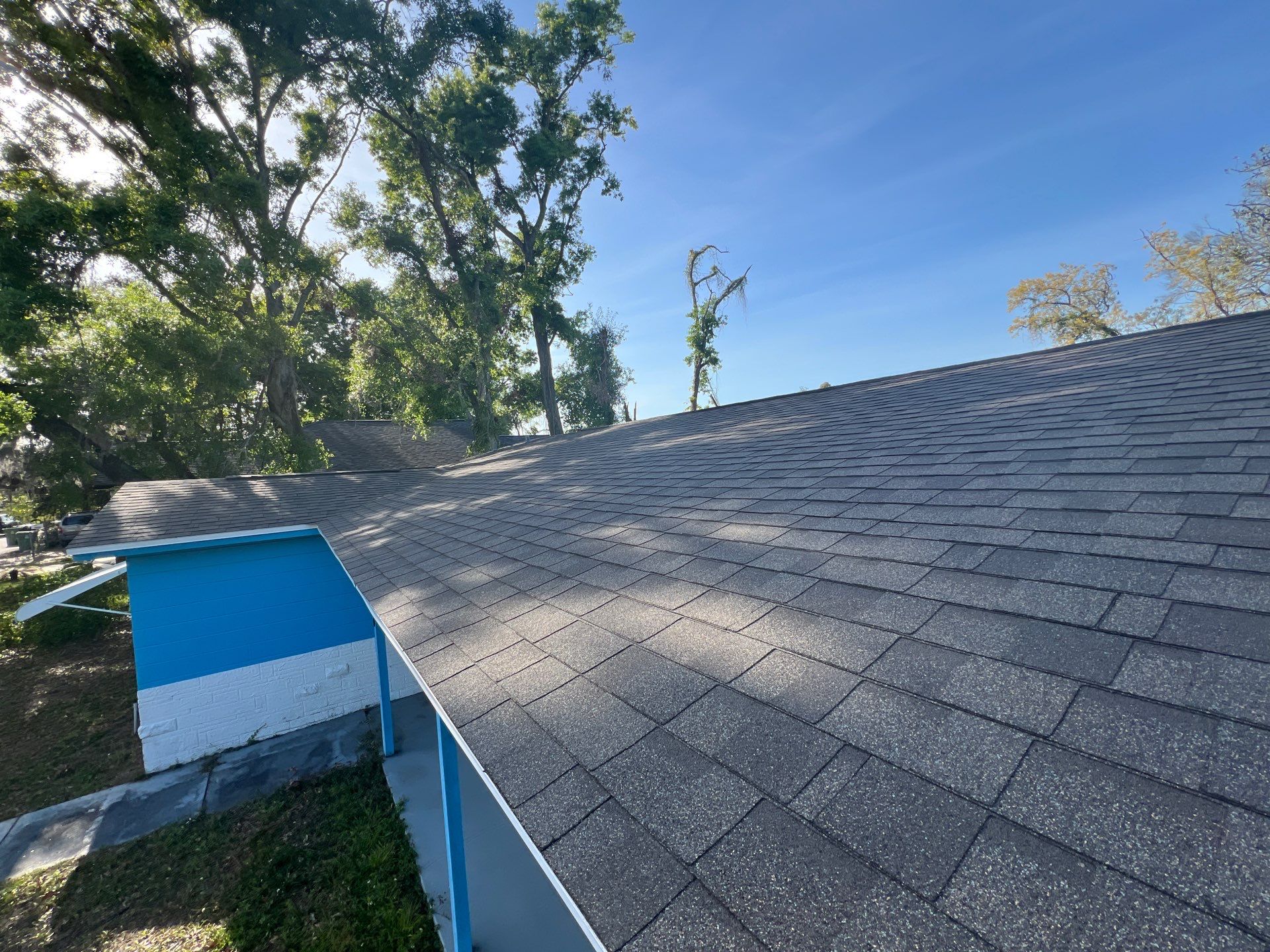 Estate Gray Shingles by Reimagine Roofing
