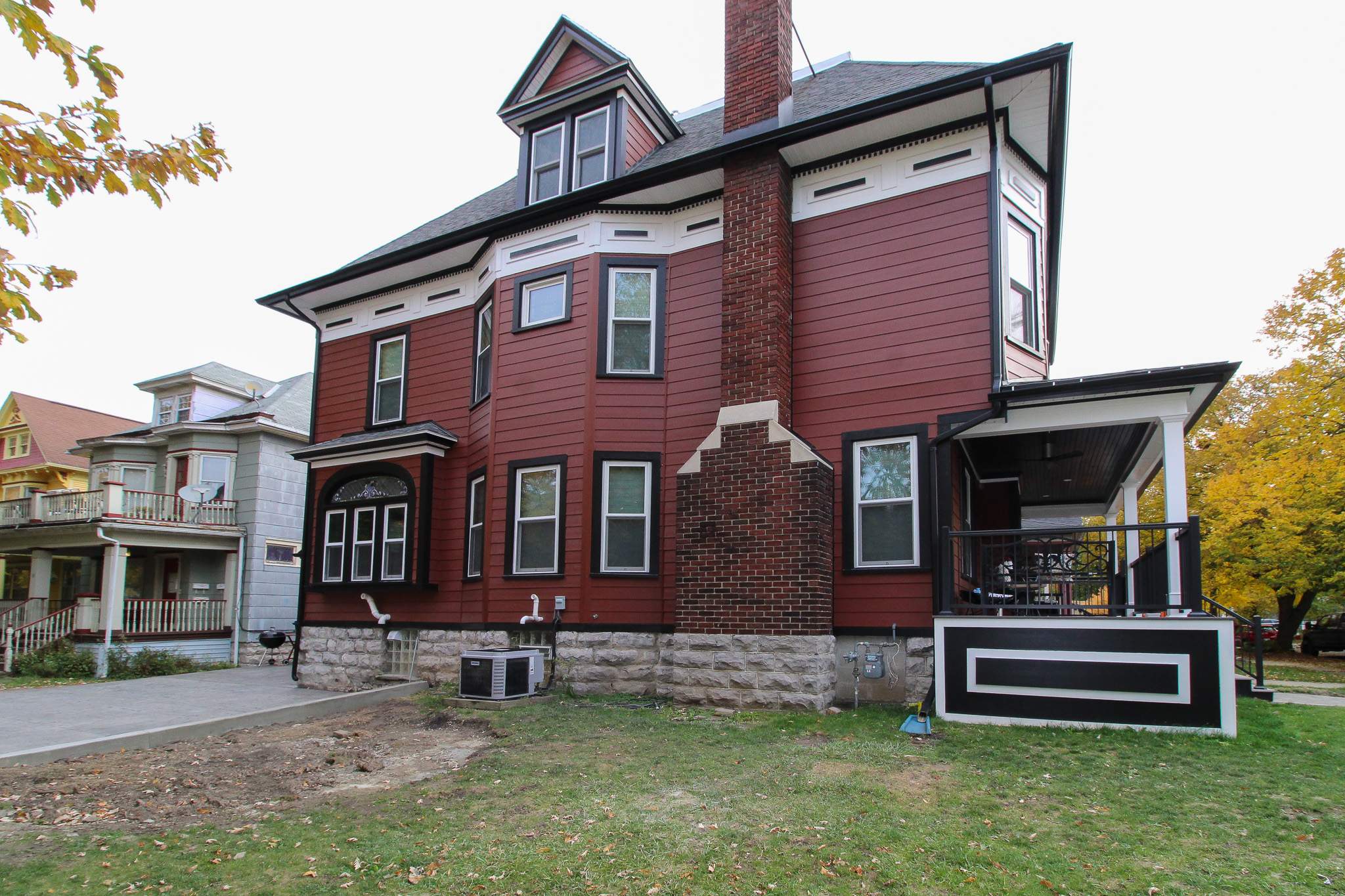 Exterior Renovations- Siding, Stamped Concrete, Porch, and Railings by Ivy Lea Construction