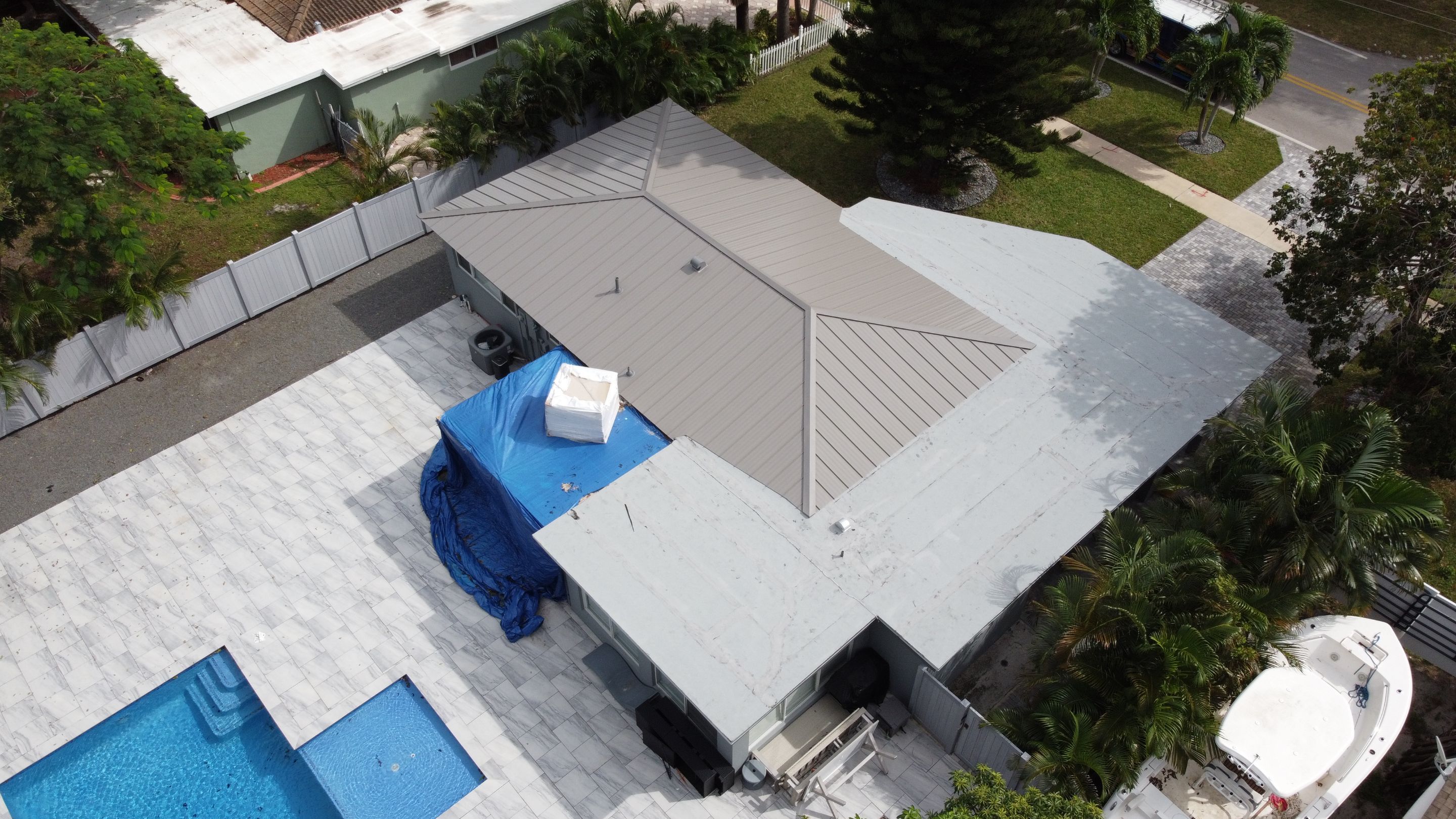 Residential Roofing Installation using 1" Nail strip metal roof by BLUES BROTHERS CONSTRUCTION CORP