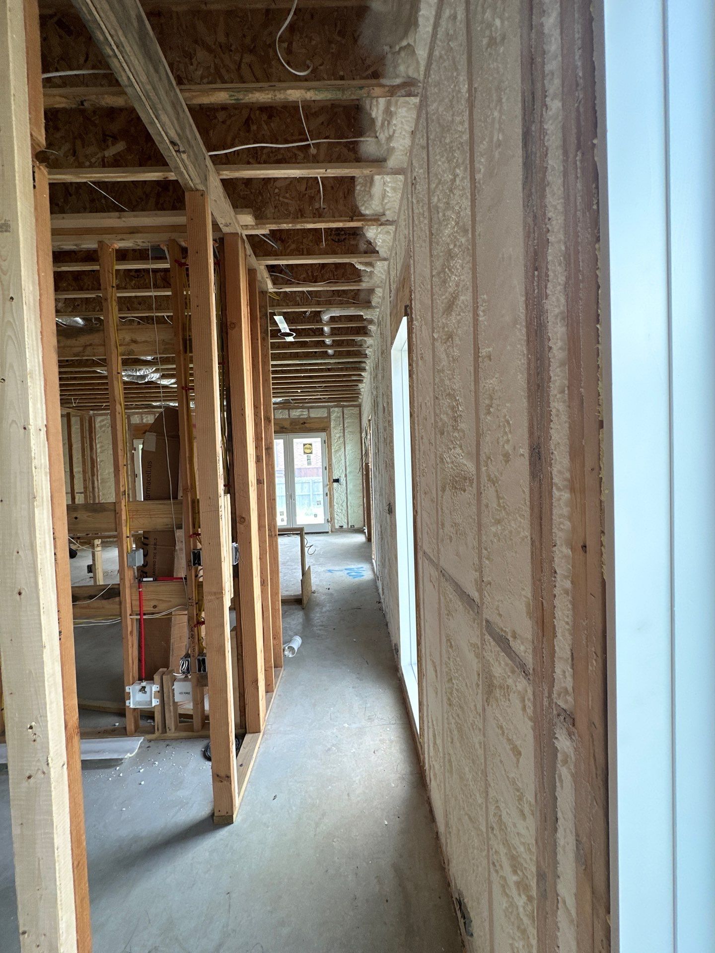 Open cell spray foam job completed at this beautiful custom home in Dallas TX by Apex Insulation Solutions