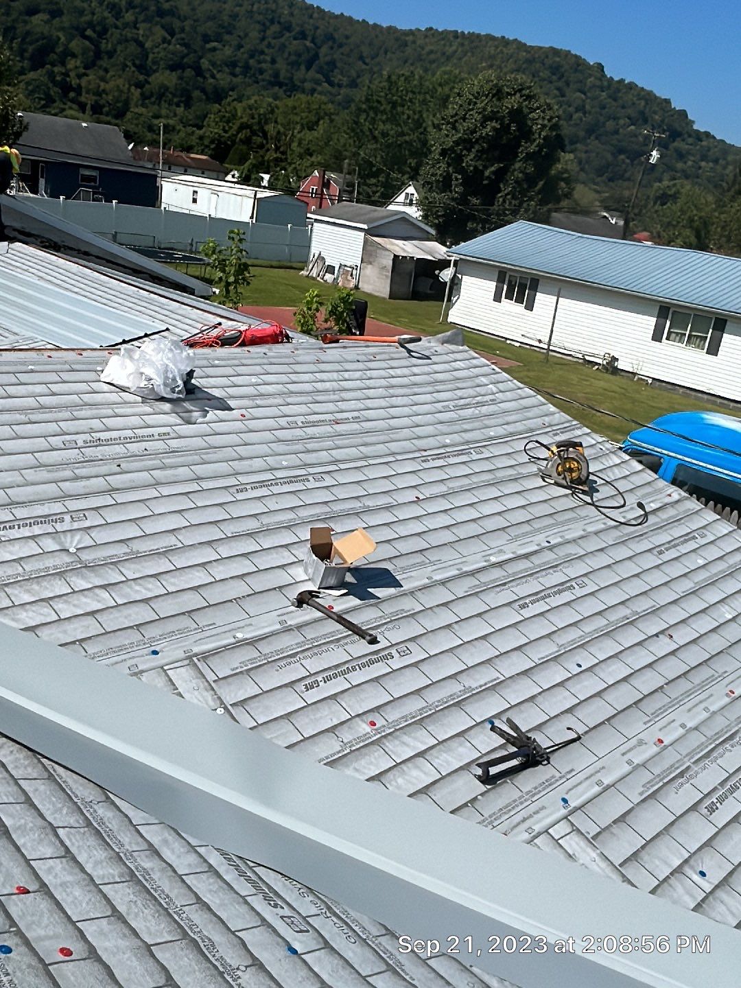 Residential Roofing Repair using Metal by Mr. Roofer