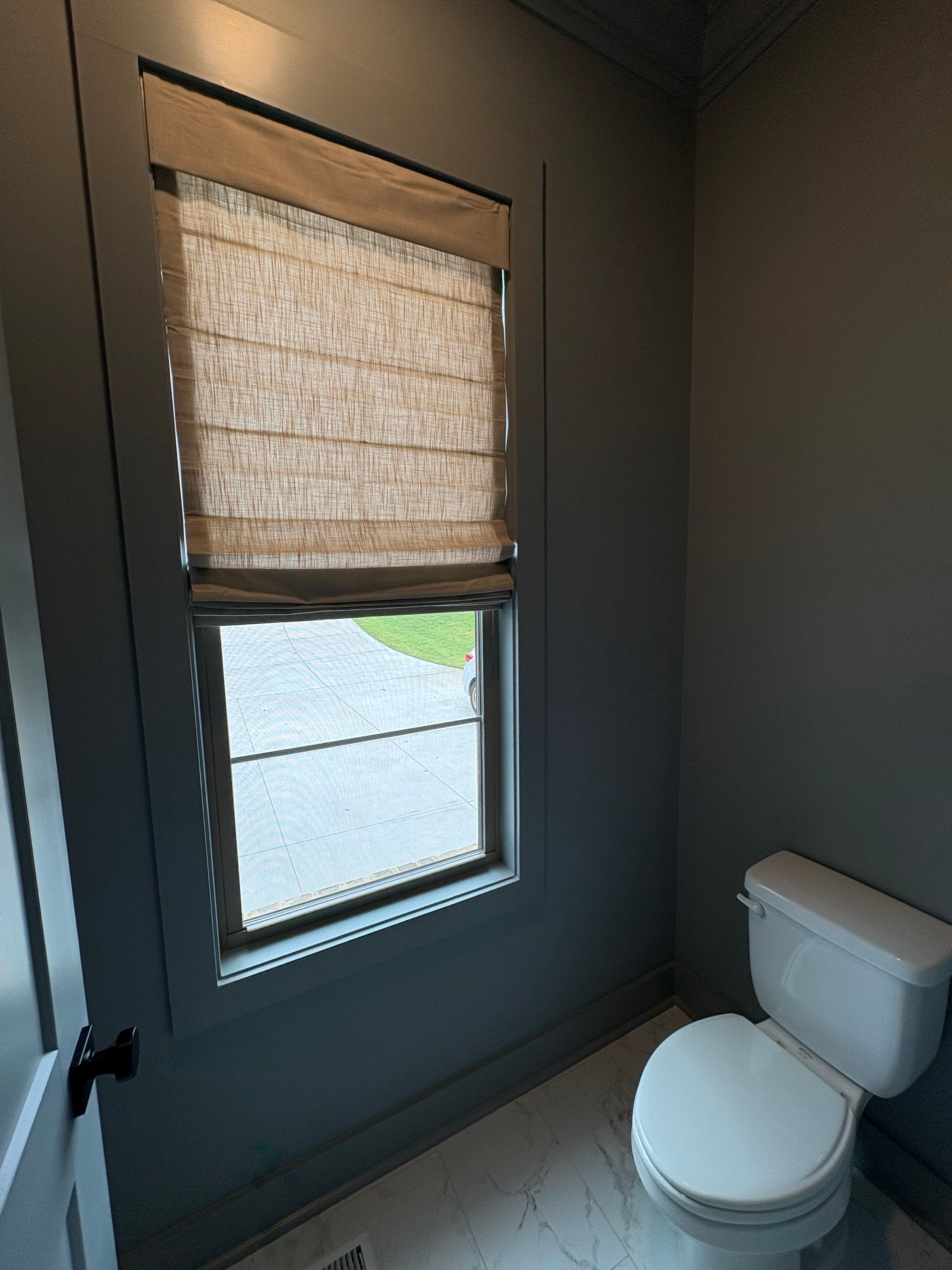 Roman and Woven Wood Shades Project in Huntsville by Blinds and Borders