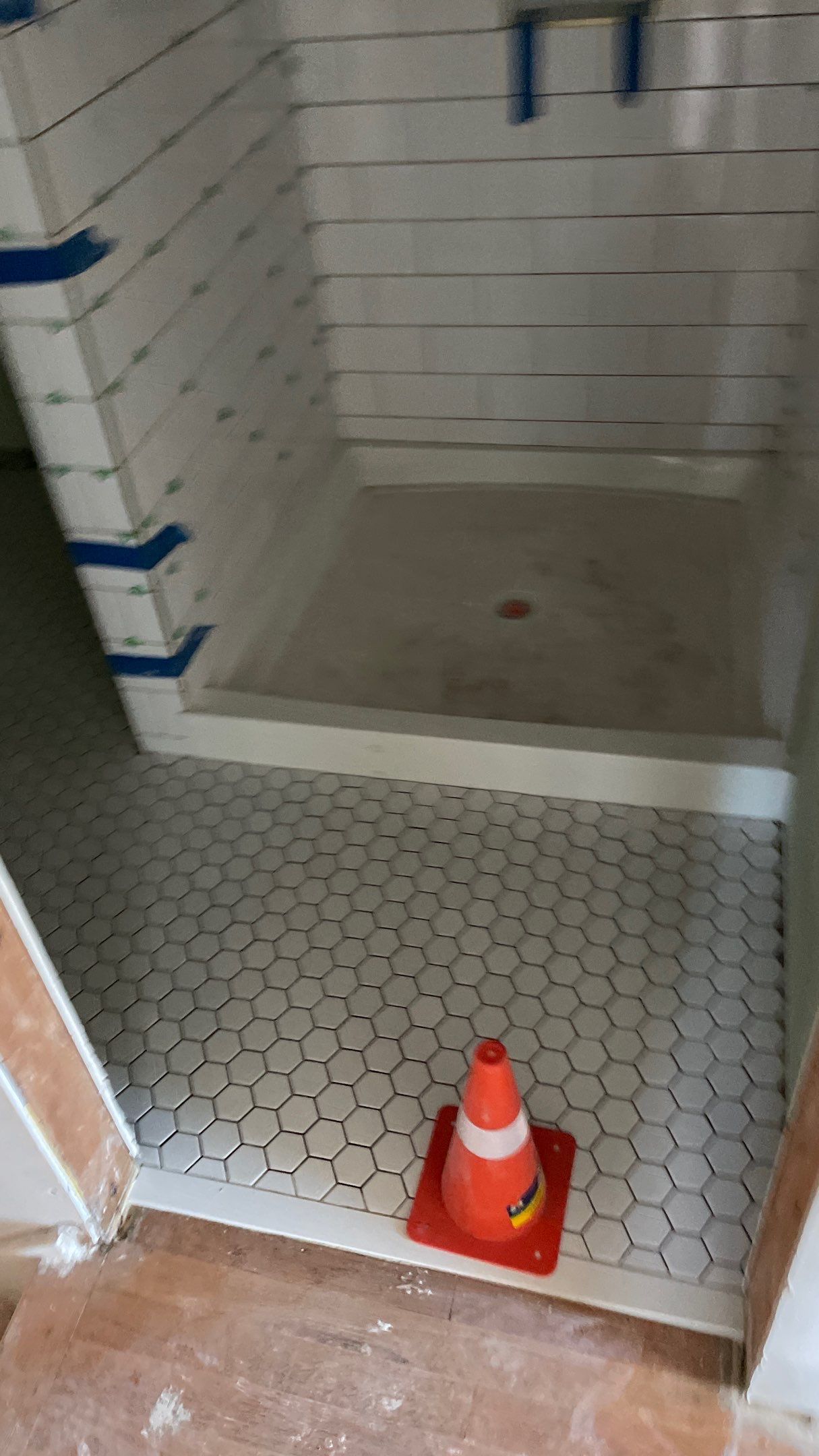 Remodeled Home with new tile floors, Showers and Refinished Oak Floors with stain and Waterbased Finish by Footprints Floors of Coastal Carolina