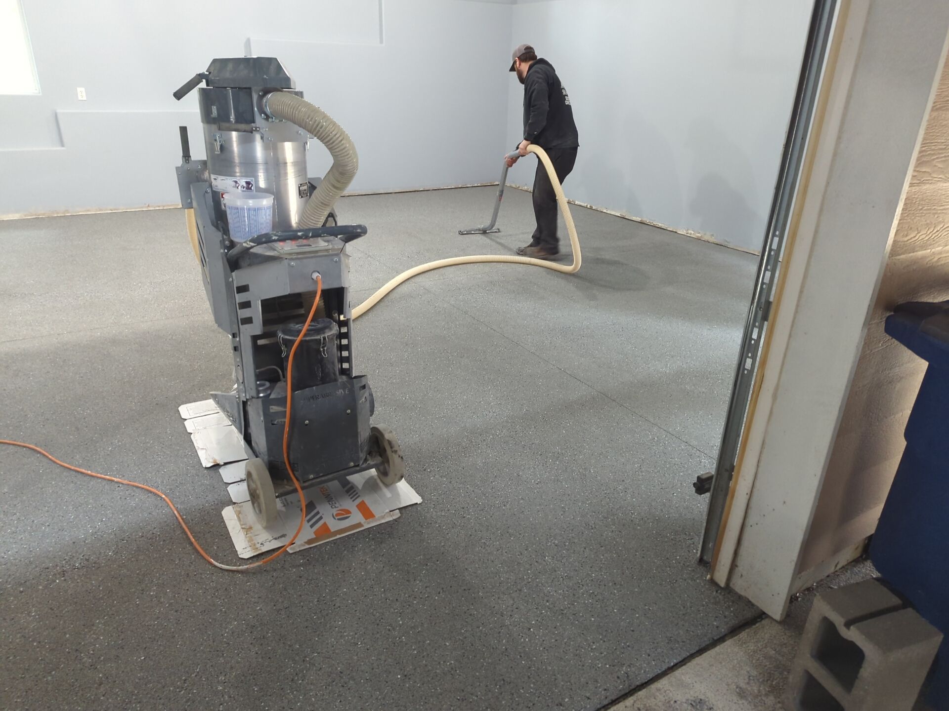 Garage Transformation using Slate Hybrid by Croc Coatings, LLC