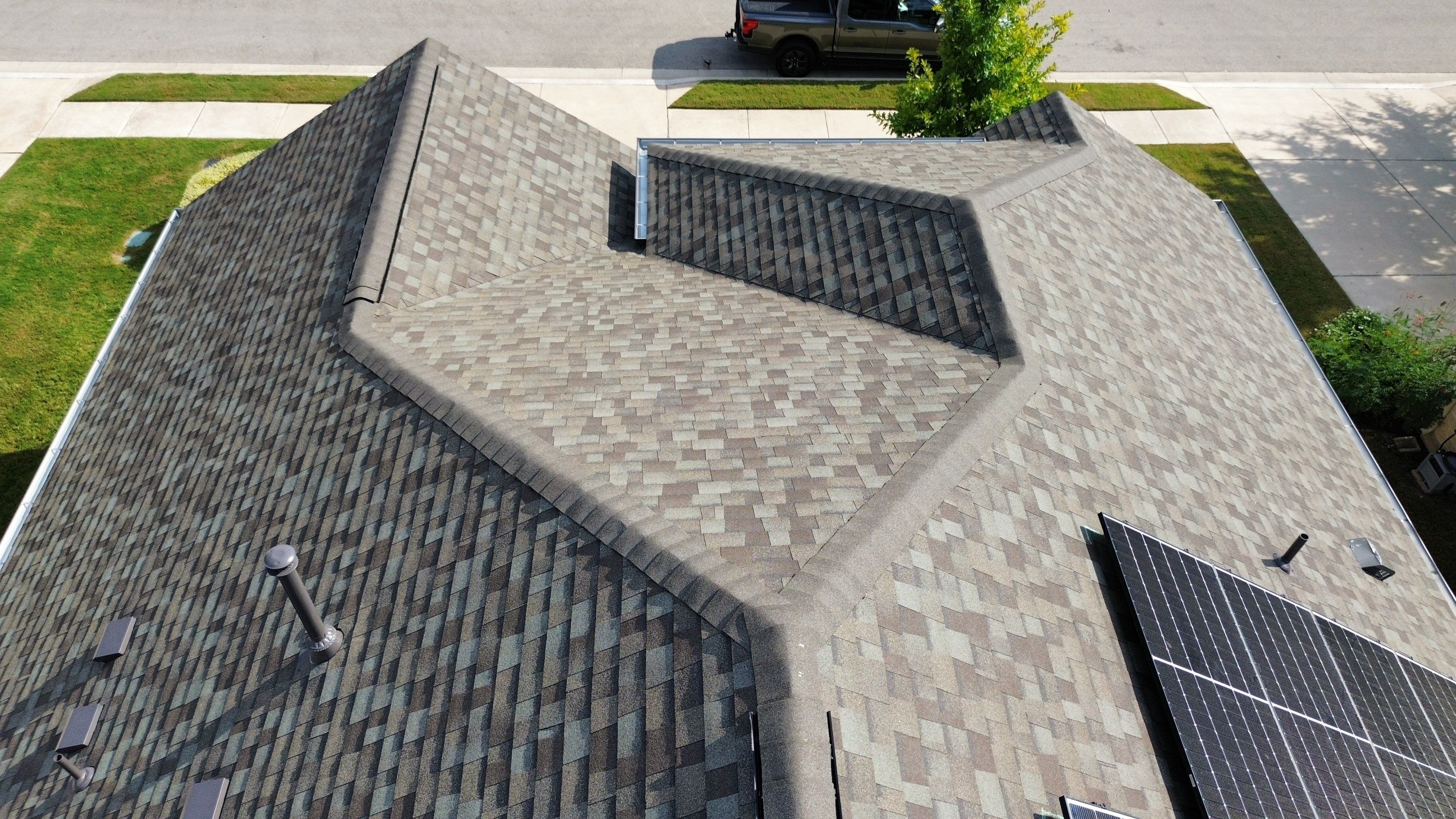 Full Roof Replacement with Solar Reinstall โ Duration Driftwood | Round Rock, TX by Kstylez Roofing & Construction