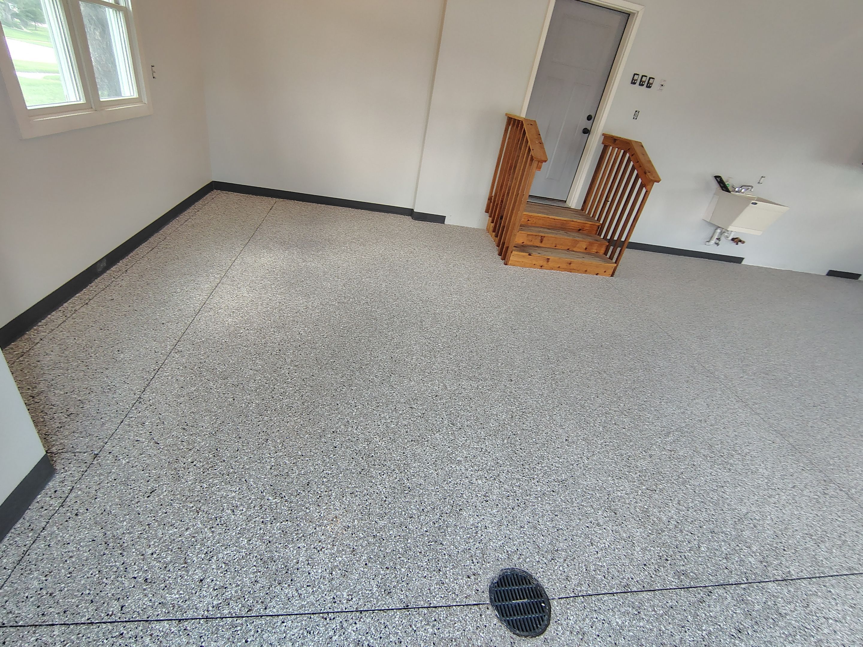 Multi-Car Garage Concrete Coating and Crack Repair in Dell Rapids by Select Painting, Coatings & Garage Cabinets