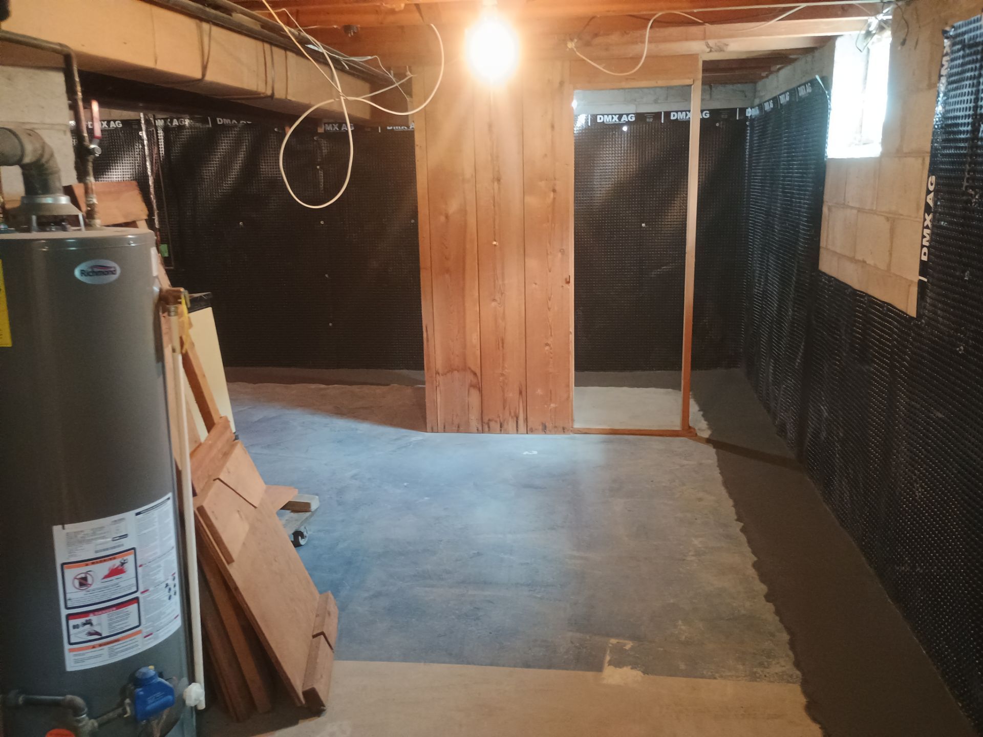Interior Drain Tile & Buried Discharge in South Minneapolis by Waterproofing Northeast
