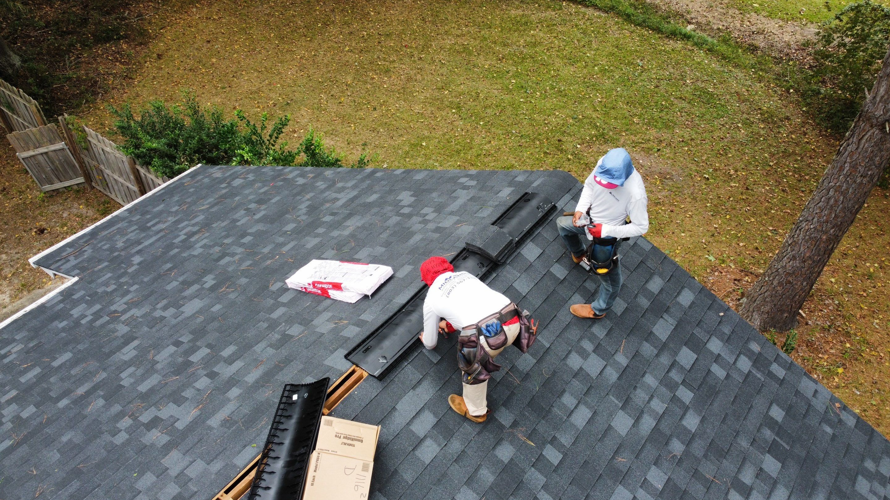 New Onyx Black Shingle Roof Replacement and Tree Damage Repair. by Midlands Roofing & Exteriors