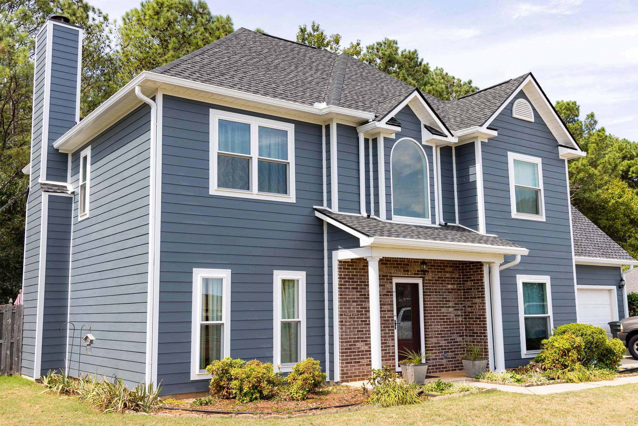 Evening Blue Hardie + Windows by Freedom Exteriors