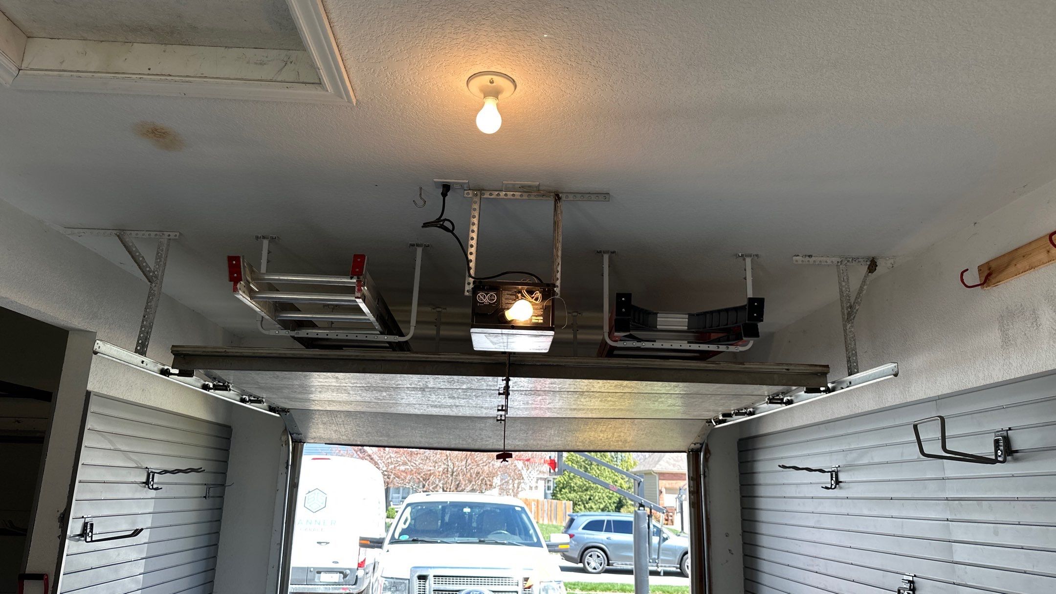 Melissa L. upgraded her garage with slatwall and overhead racks by Banner Garage