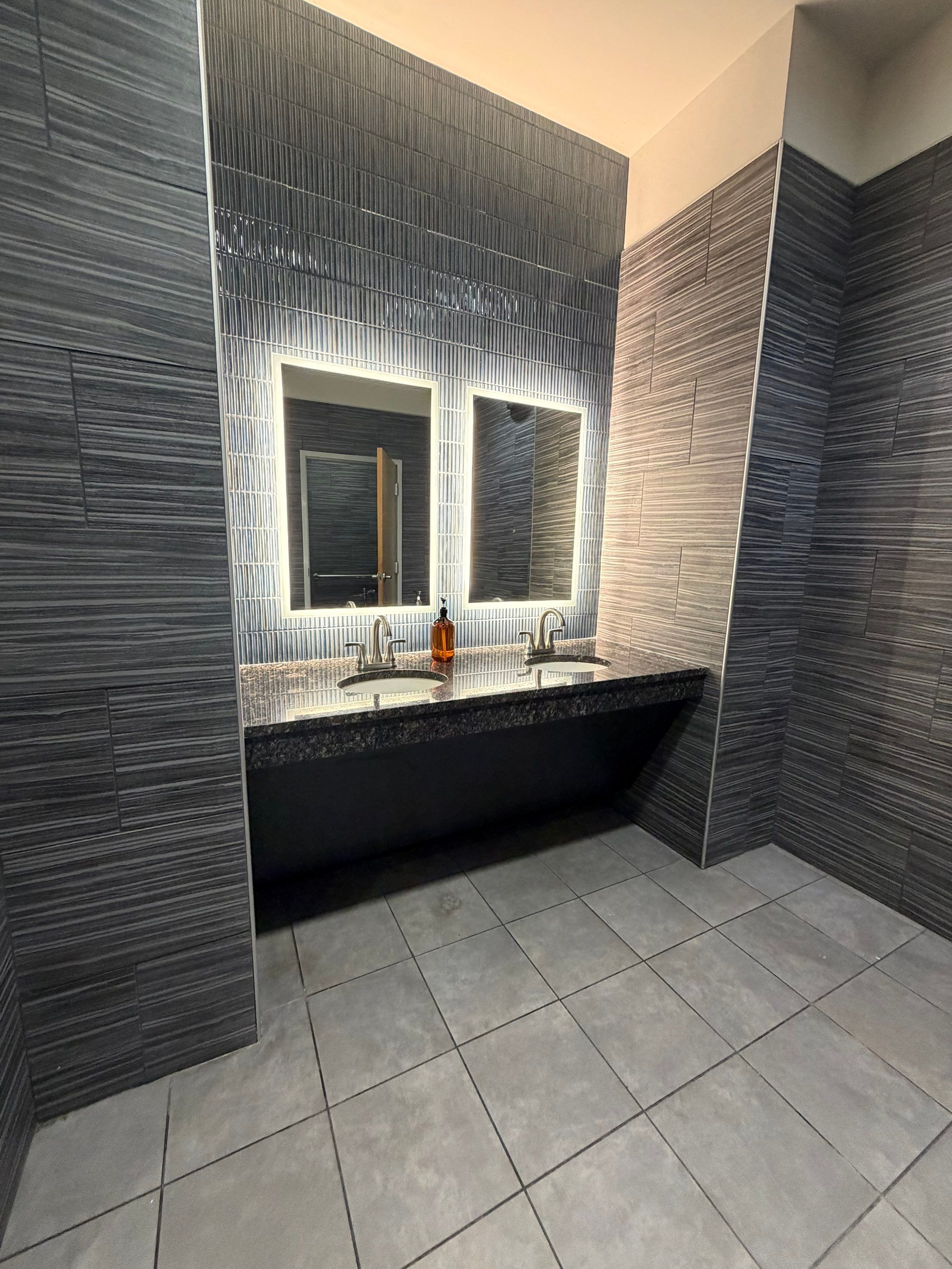 Sterling One Life - Men’s and Women’s Locker Room mirrors and backsplash by Nova HomeWorks