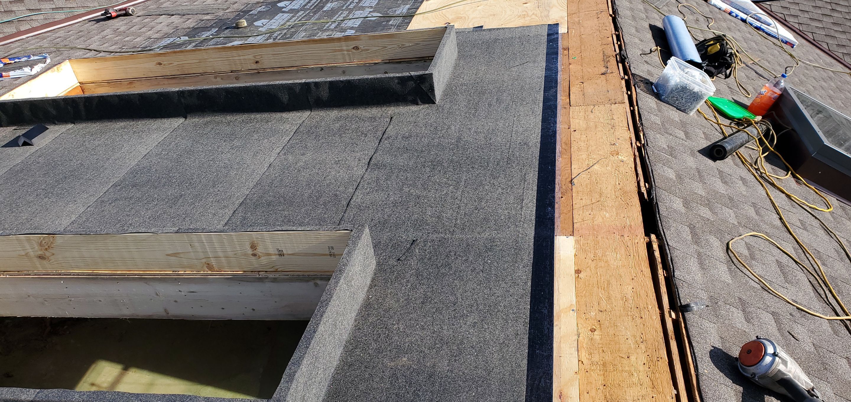 Skylight removal and install  by Absolute Roofing and Construction
