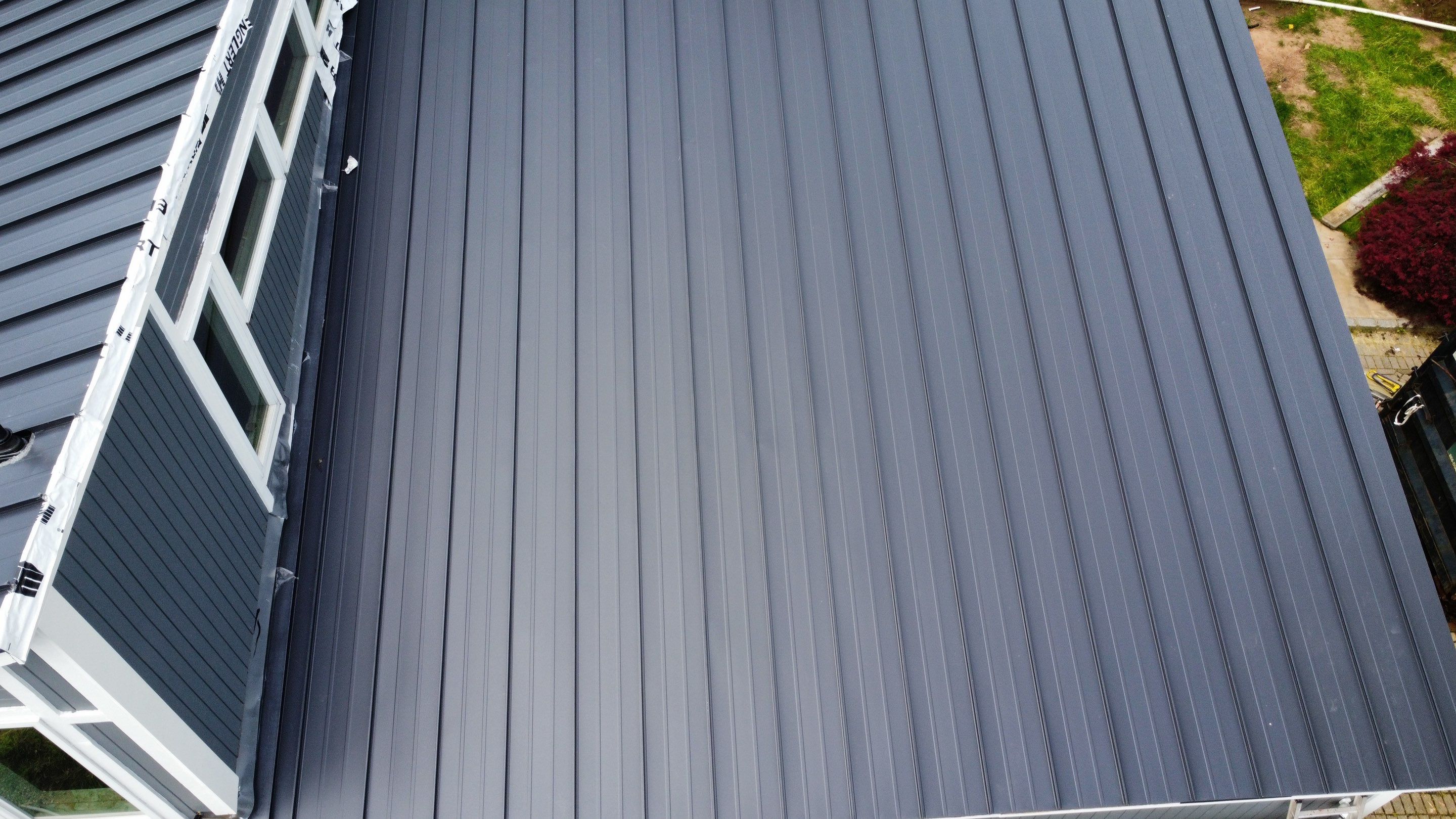 Residential Roofing Installation using Aluminum 032GA - Color Matte Black by CMNG LLC