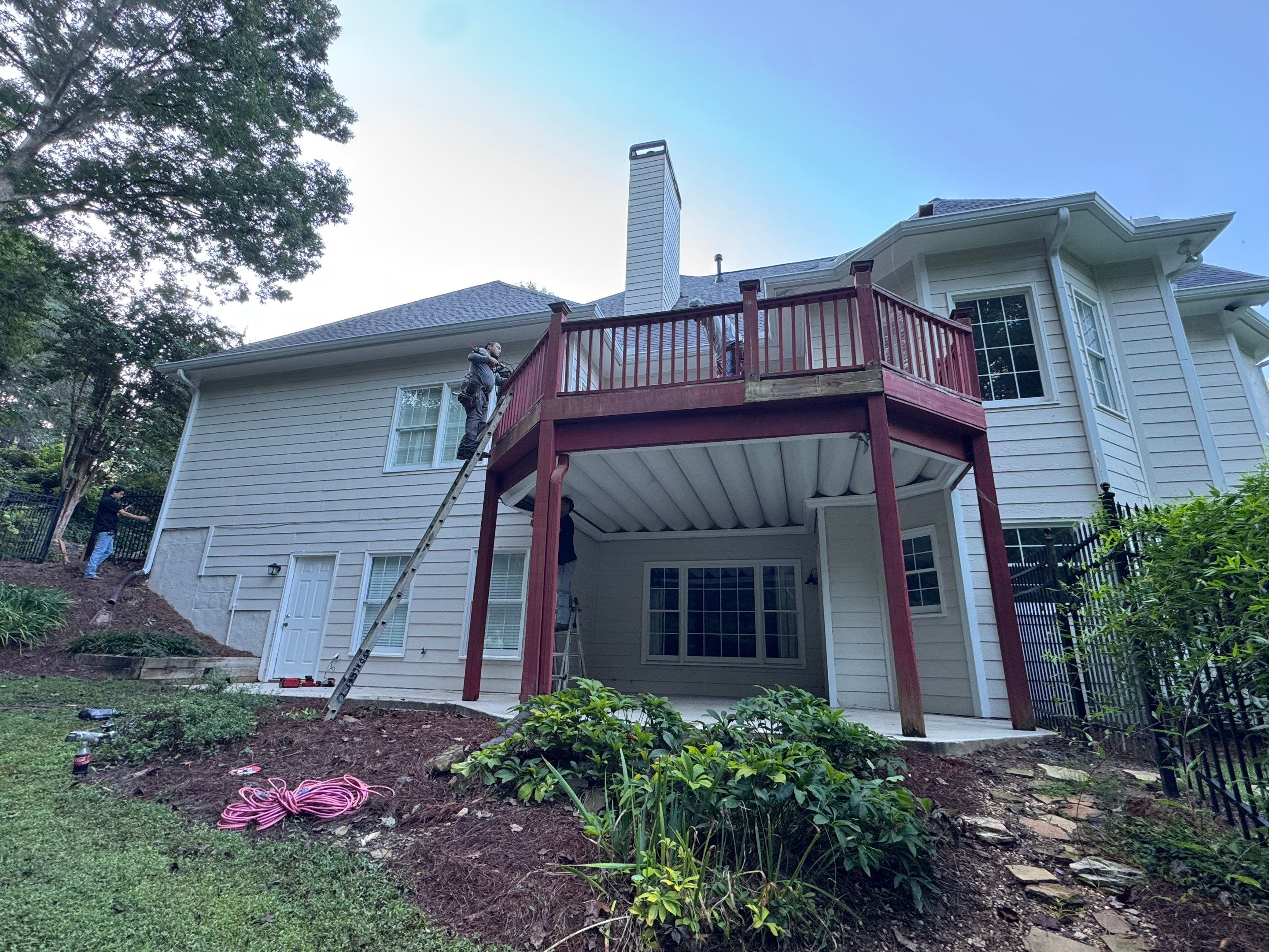 Elevated Composite Deck Replacement with Metal Railings in Smyrna by Swift Home Renovations 