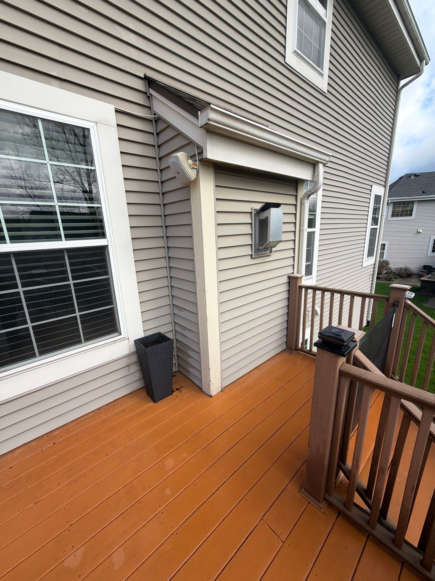 Elevated Wood Deck Refinishing and Railing Restoration in Waukesha by OCS Contracting Services