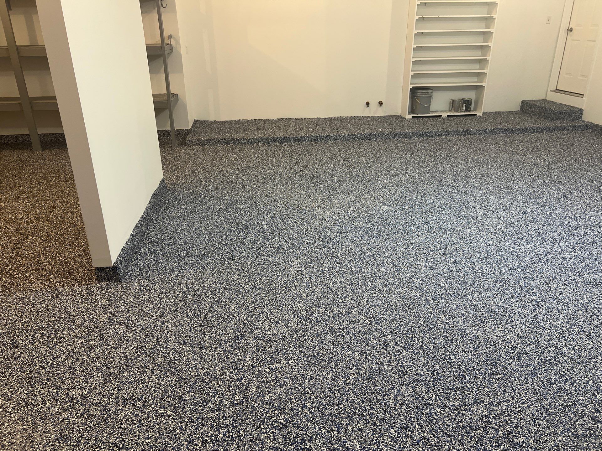 Custom Epoxy Flake Floor and Garage Wall Renovation in Ada by Gordon Painting