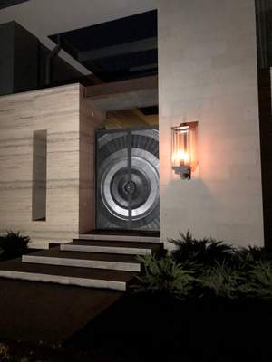 Custom Metal Entry Door and Exterior Lighting Installation