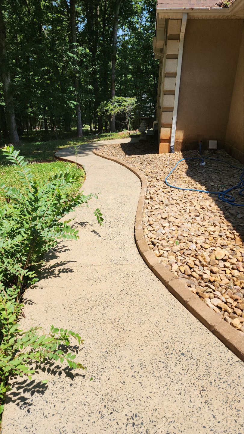 Driveway Clean using cleaner by Power Wash Masters LLC
