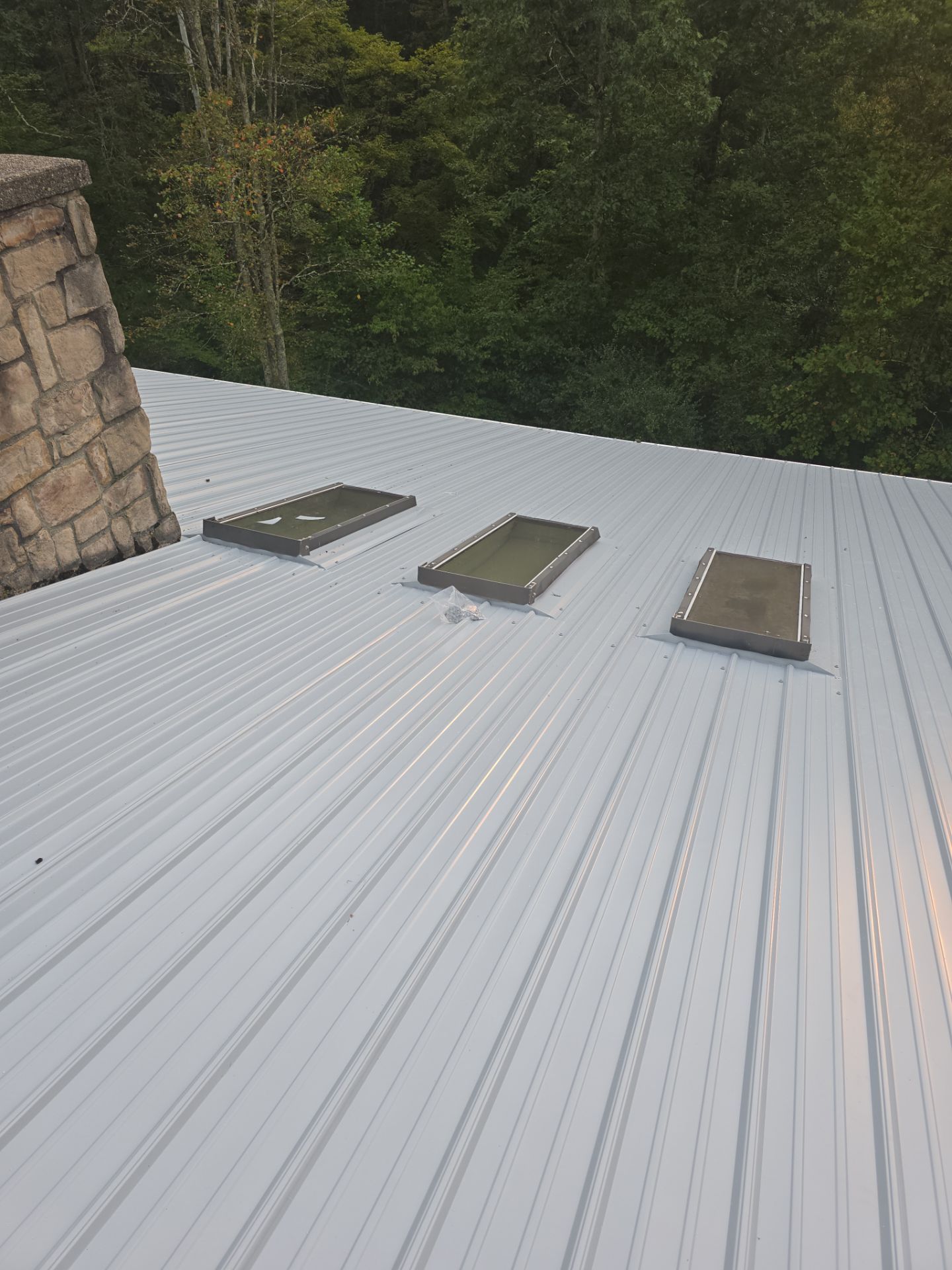 Residential Roofing Installation using Metal by Rainstoppers Roofing