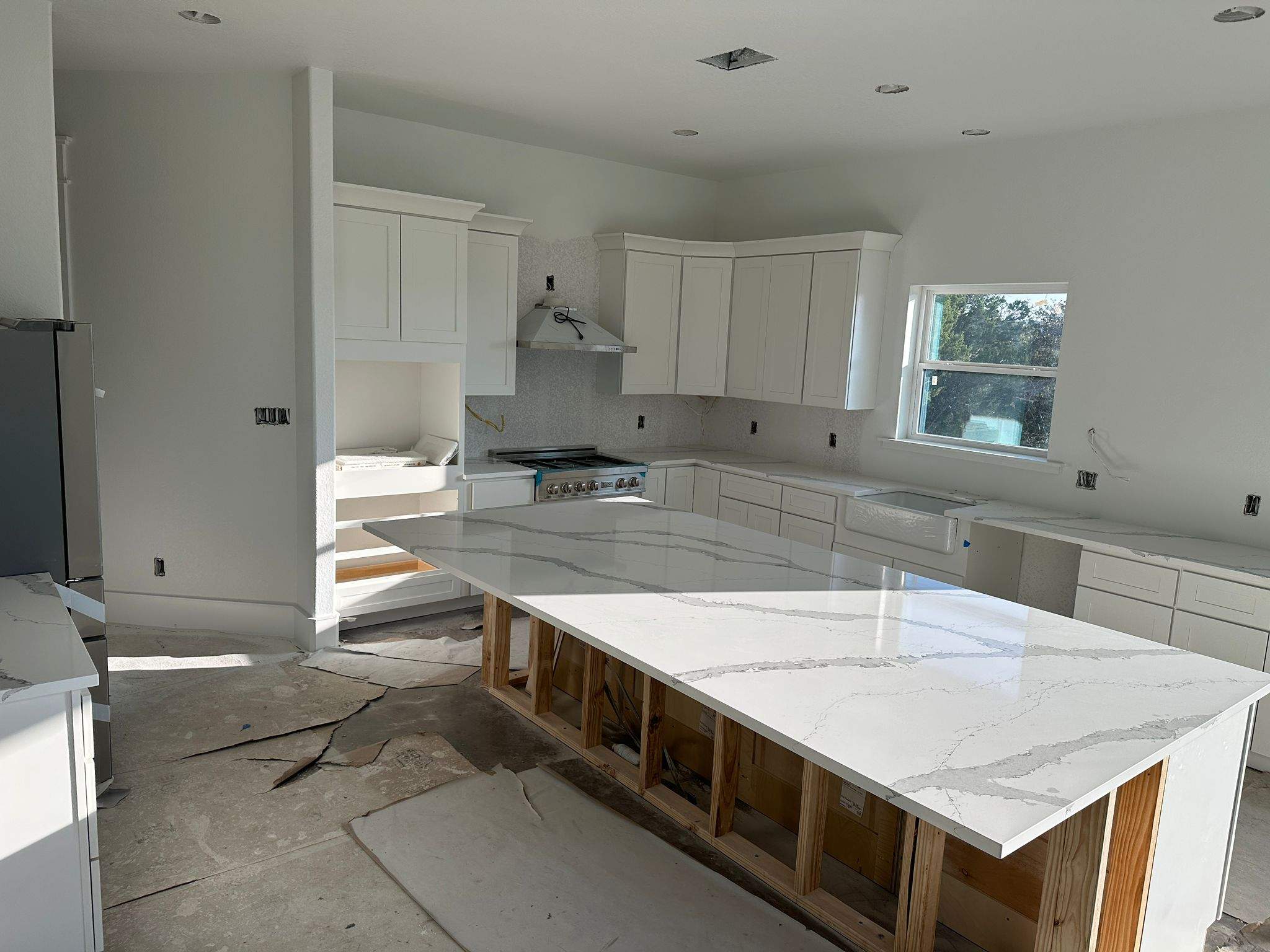 Kitchen and Bathroom Countertop Upgrades Featuring Gray Veined Quartz by Mena stone surfaces