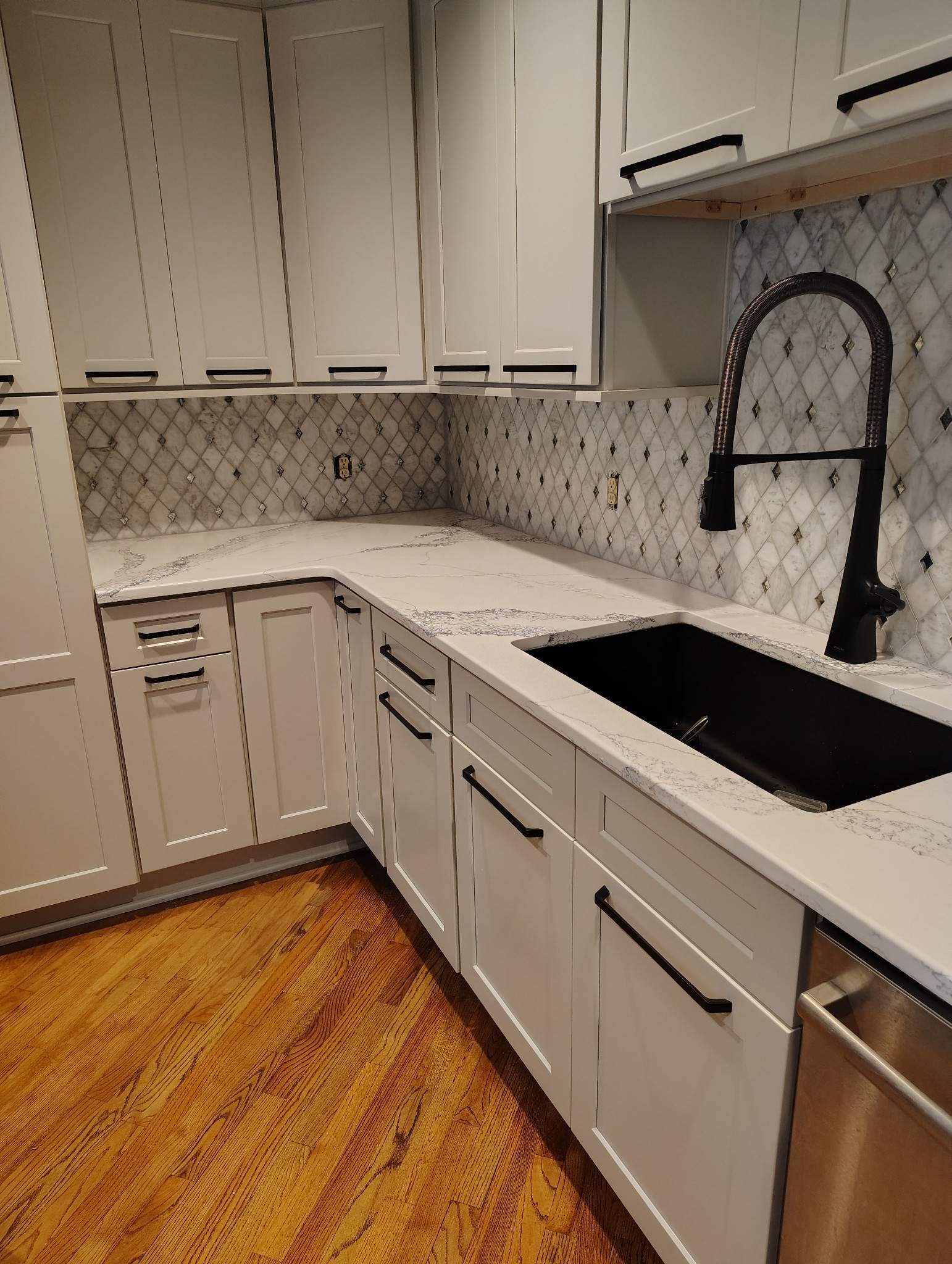 Glamorous Kitchen Backsplash  by Footprints Floors of Nashville