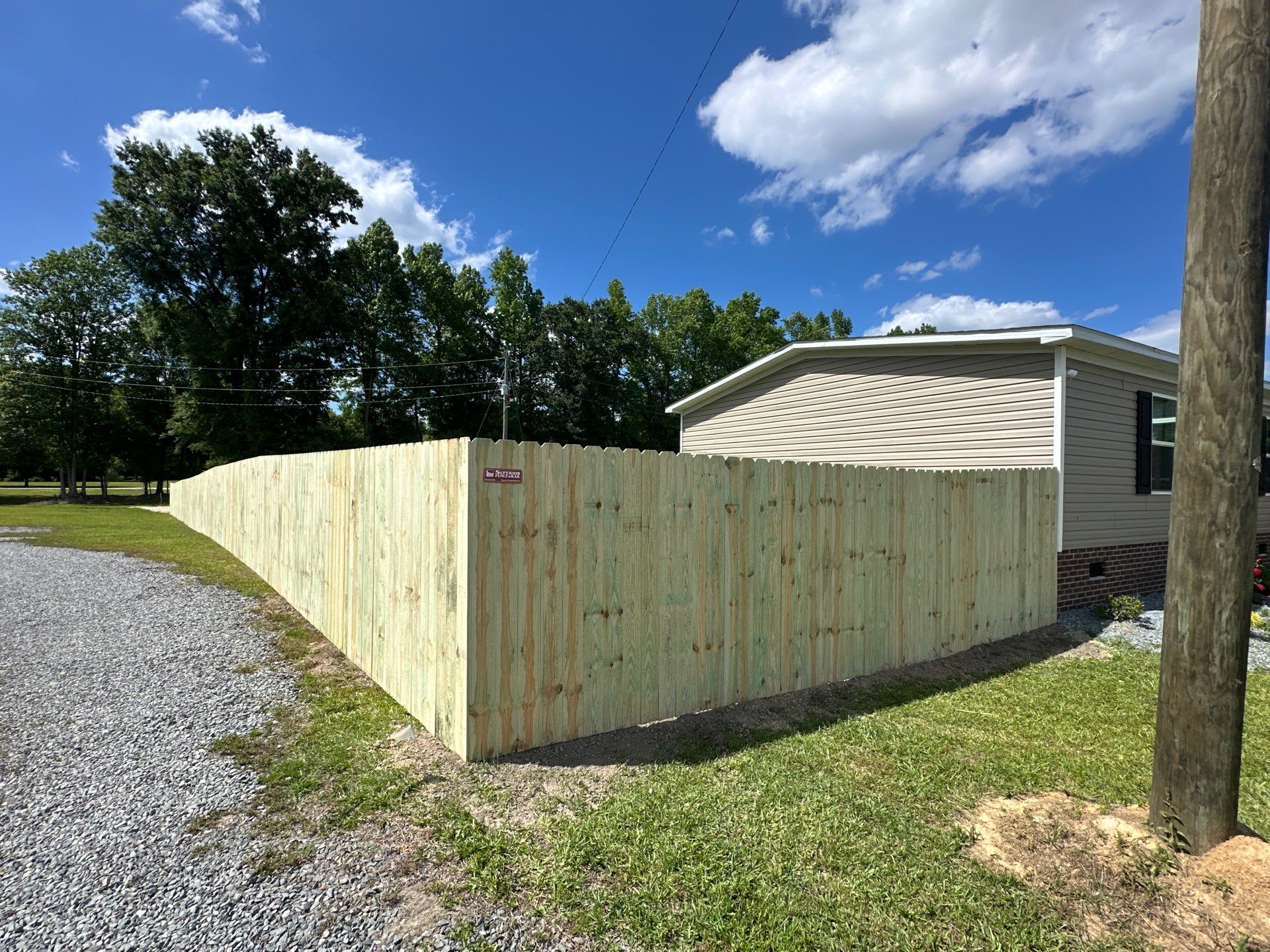 Wood Privacy Fence Installation for Beulaville Residential Property by Superior Fence and Rail