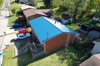 Residential Roofing Installation using Metal