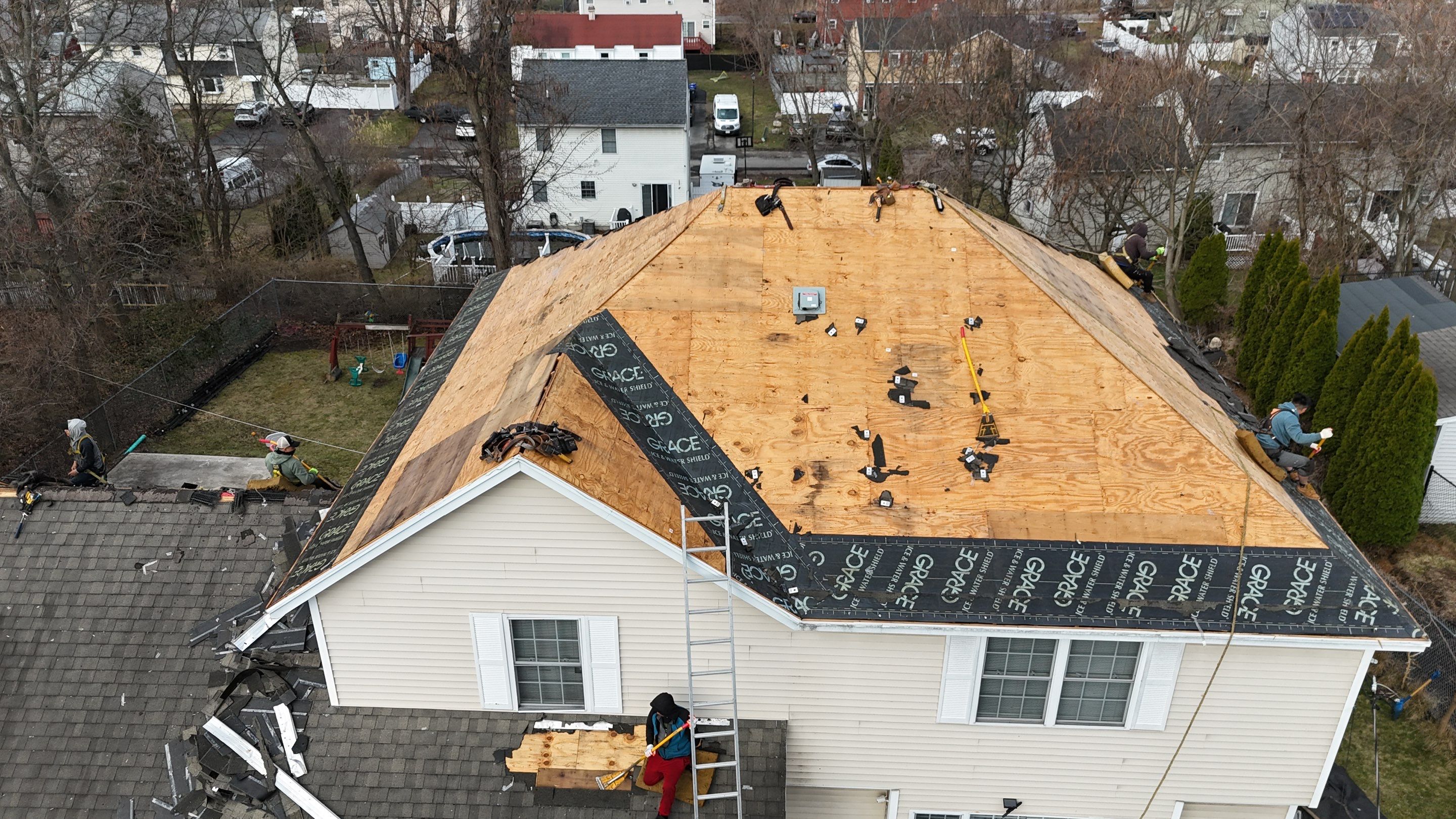 Full Roof Replacement + Seamless Gutters by Mighty Dog Roofing of Greater Middlesex County