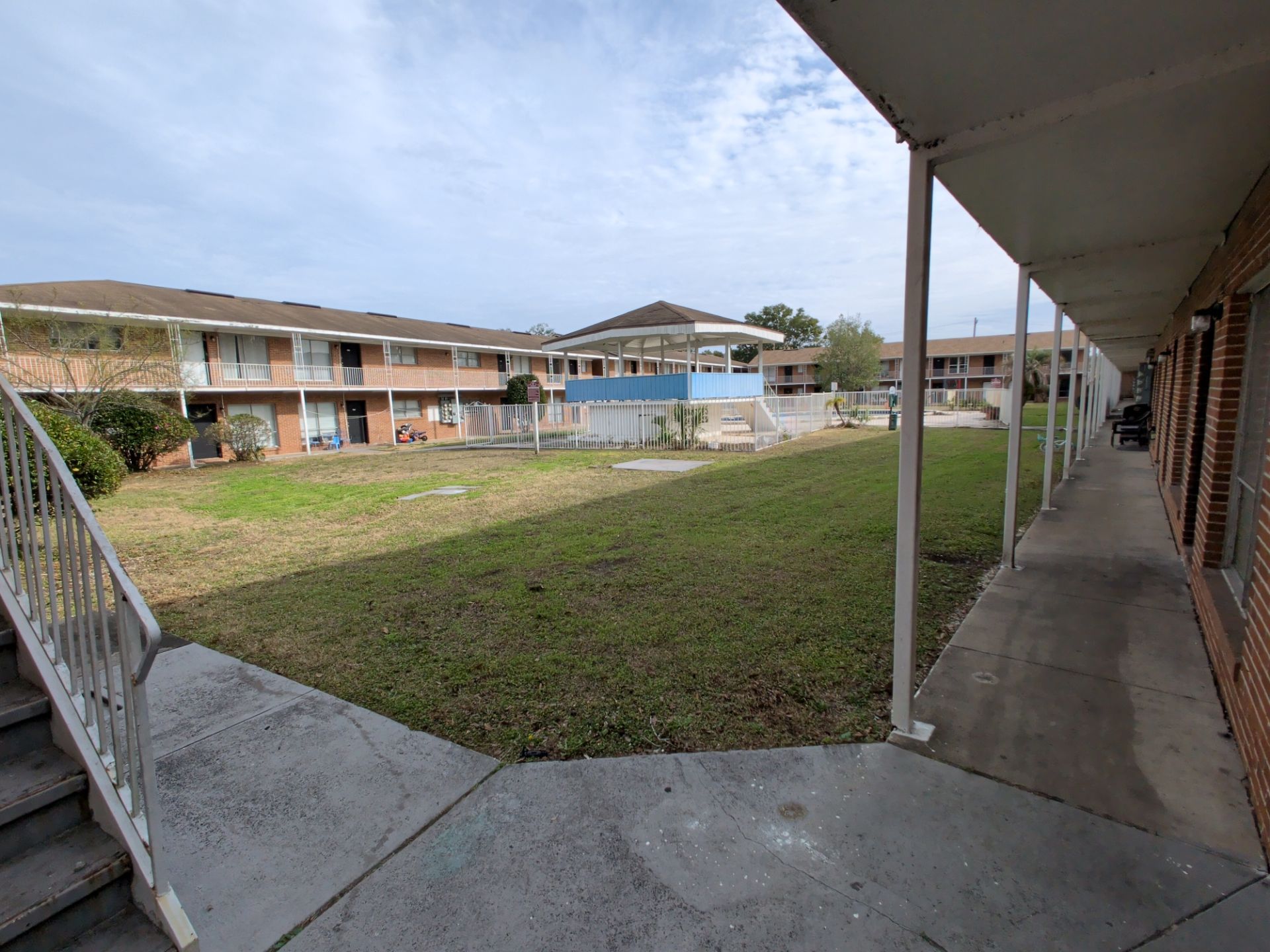 Apartment Landscape Cleanup & Ongoing Grounds Maintenance — Cimarron Apartments (Arlington) by Harmoni Home Services