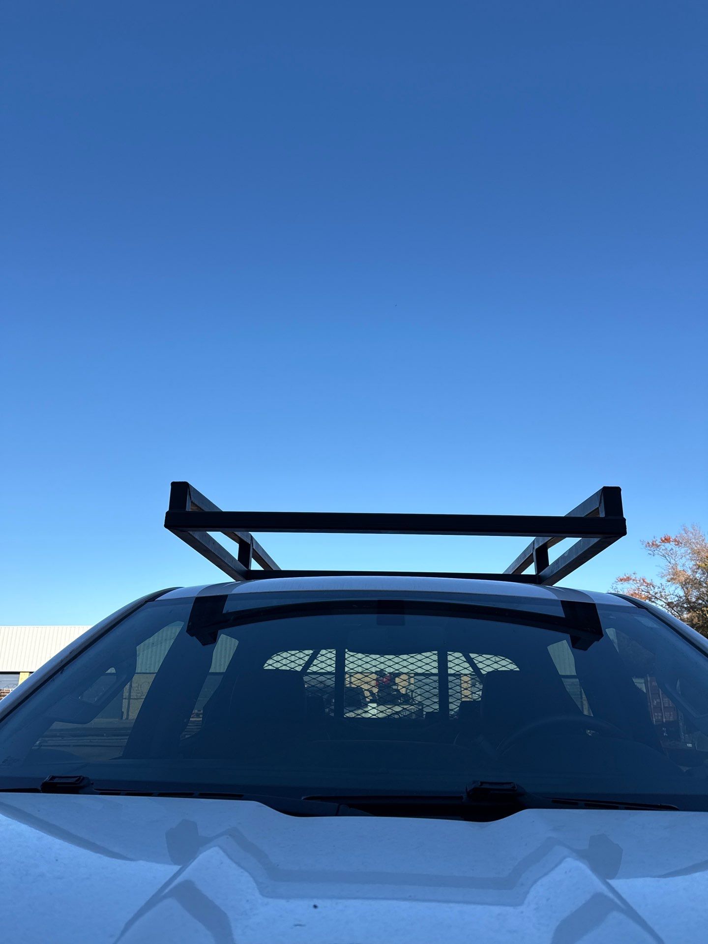 Seamless Gutters Ladder Rack by Gregory Sandstrom