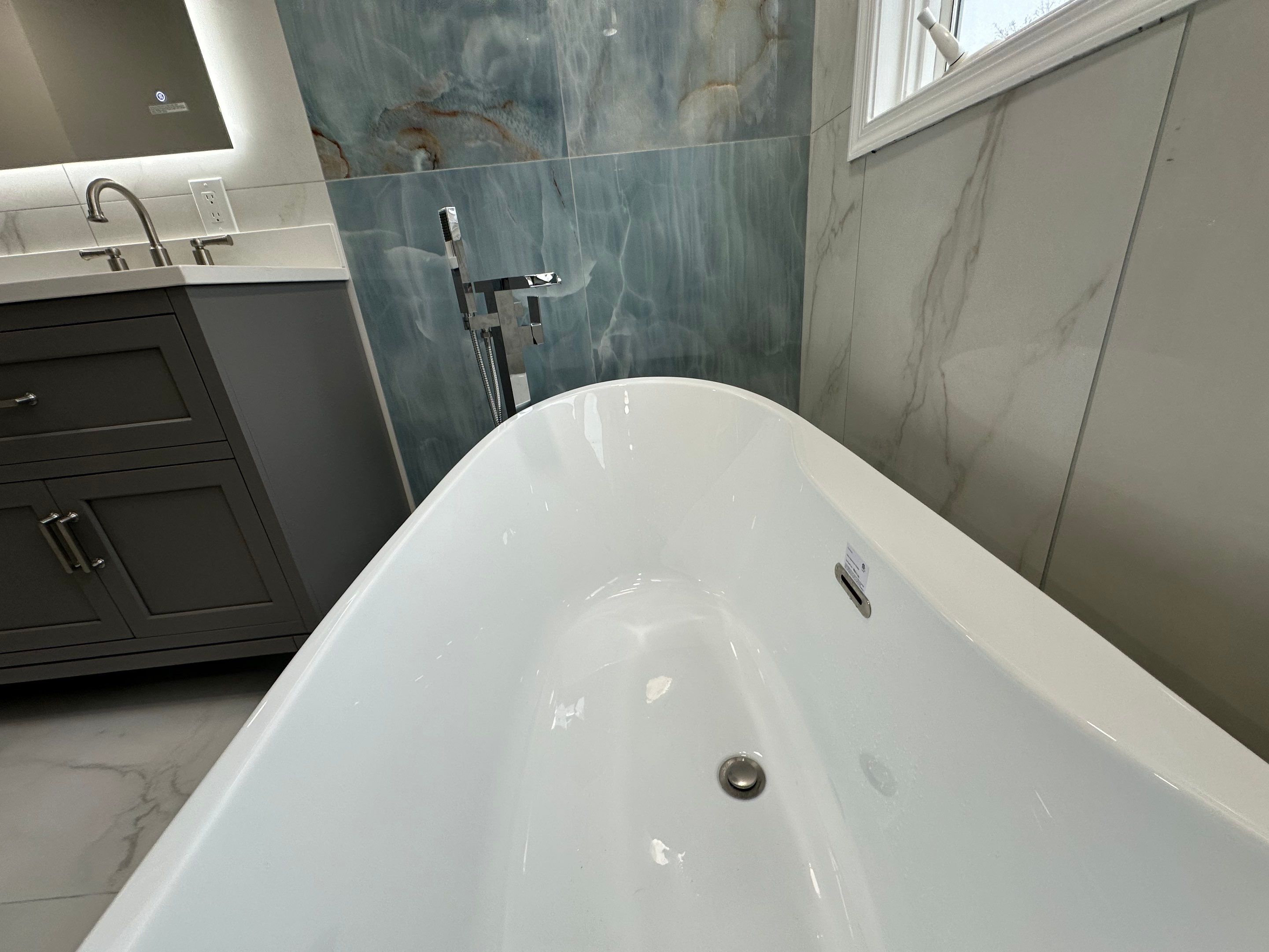 Bathroom Remodel using Tile by Home Concepts Construction