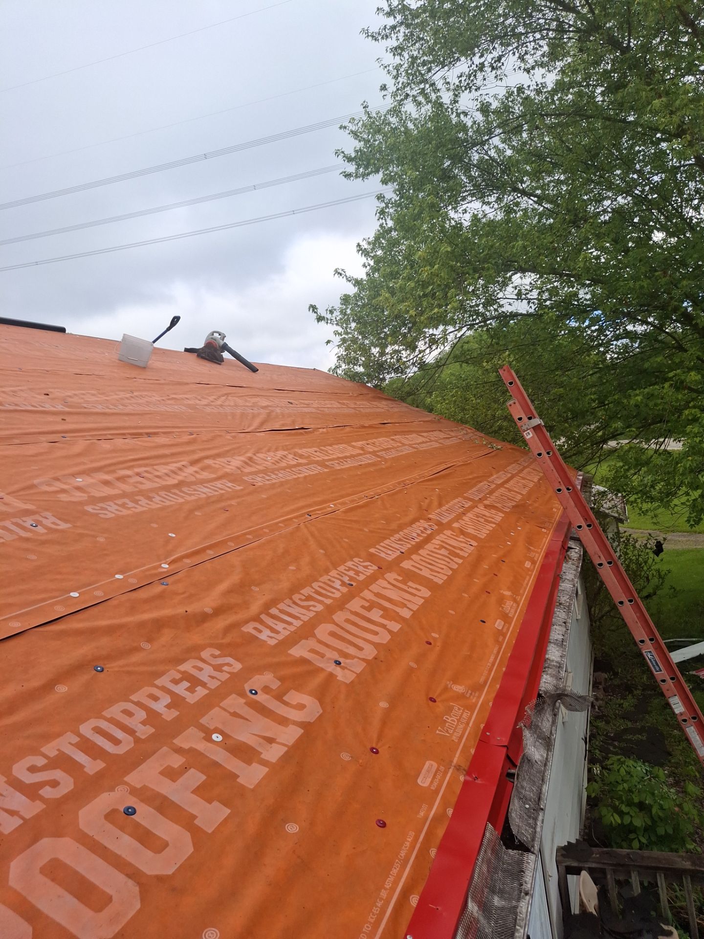Residential Roofing Installation using Metal by Rainstoppers Roofing