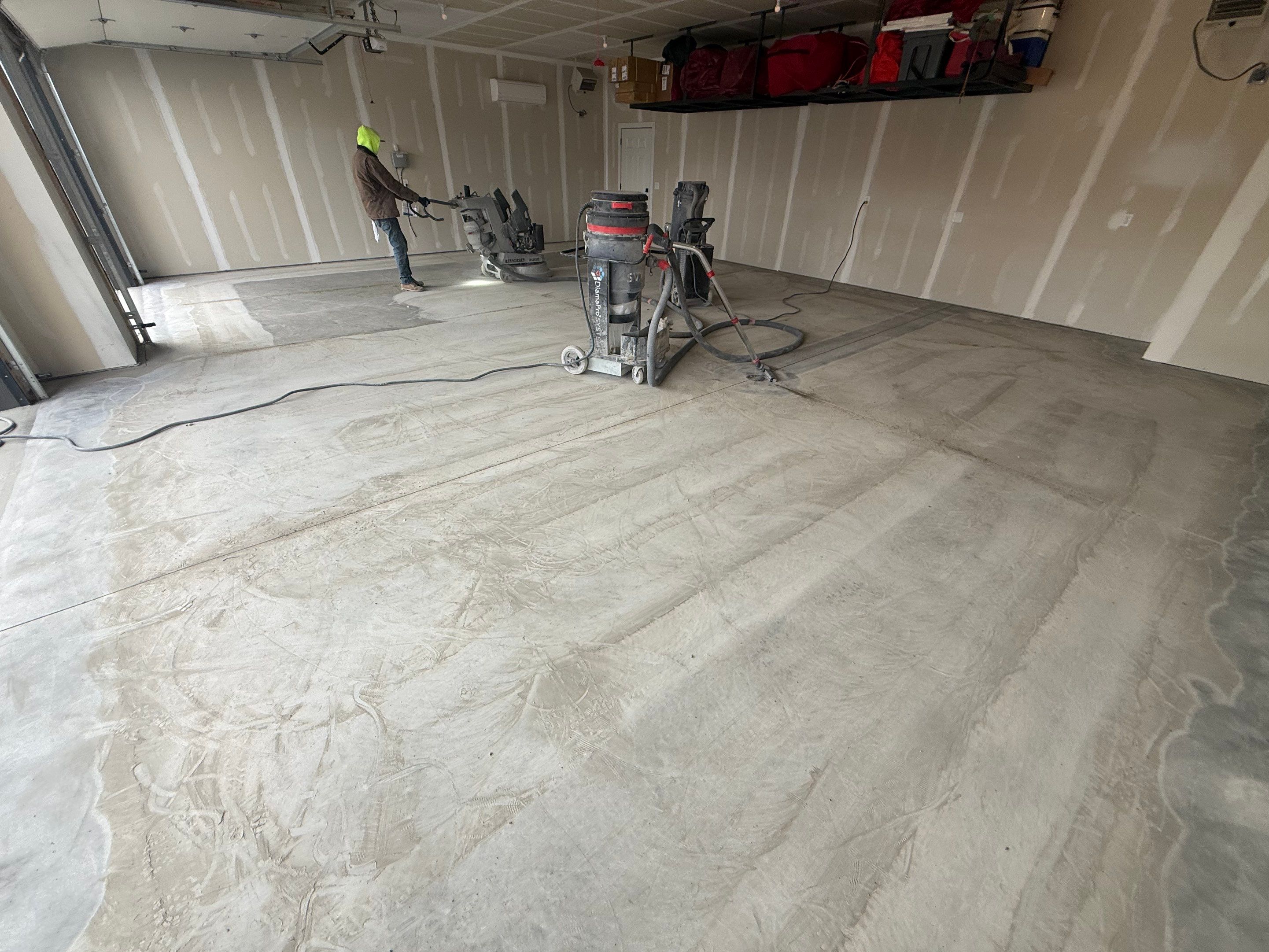 Grey Speckled Epoxy Floor Coating for Sioux Falls Garage by Select Painting, Coatings & Garage Cabinets
