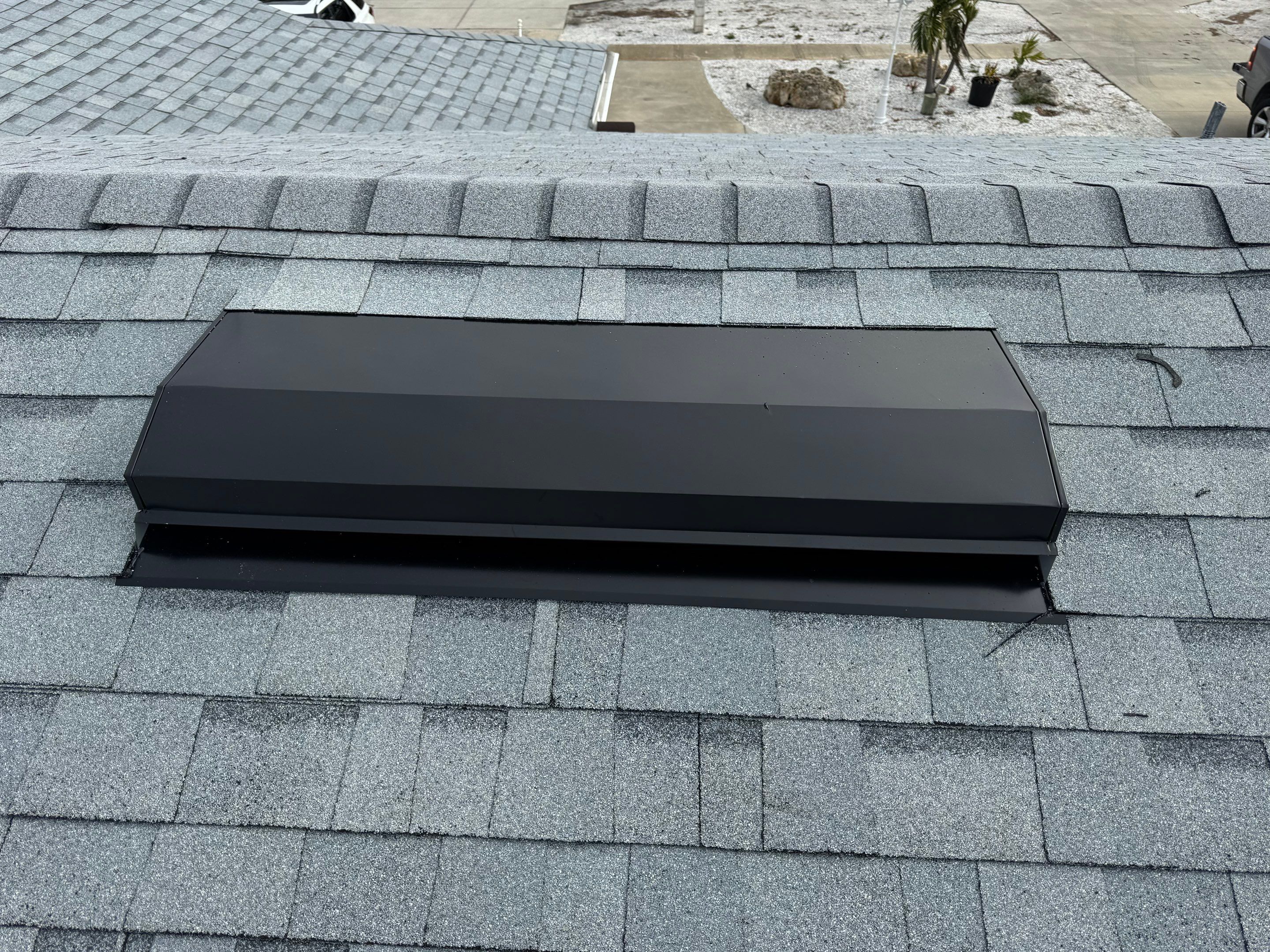 Estate Gray Shingles by Reimagine Roofing