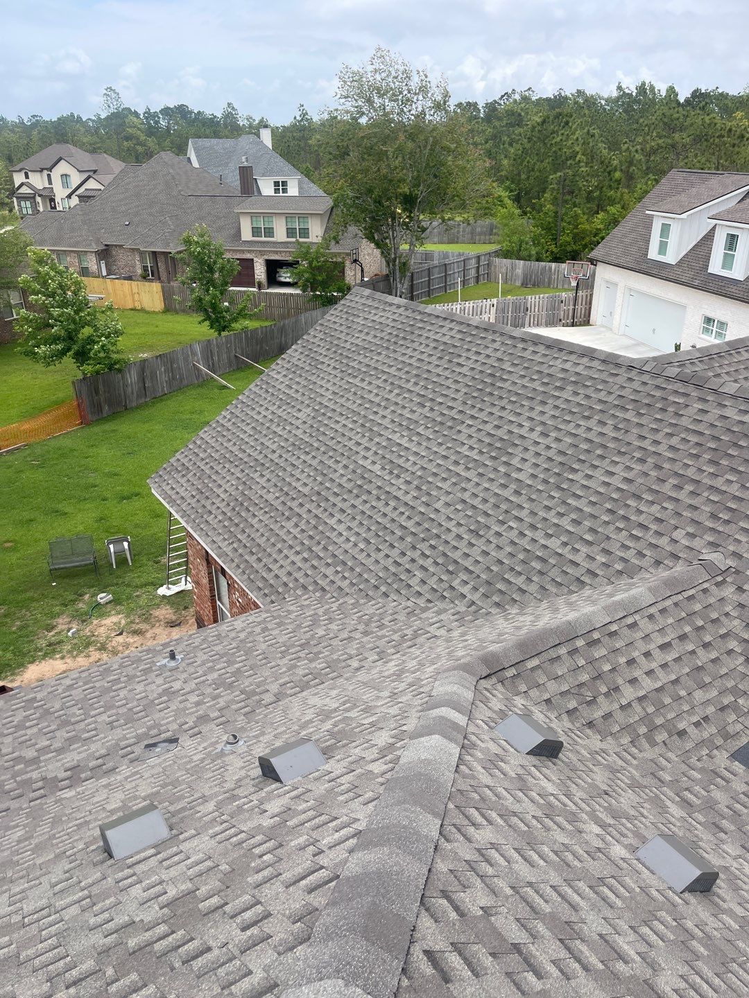Residential Roofing Installation using Roof Replacement by American Roofing & Construction LLC