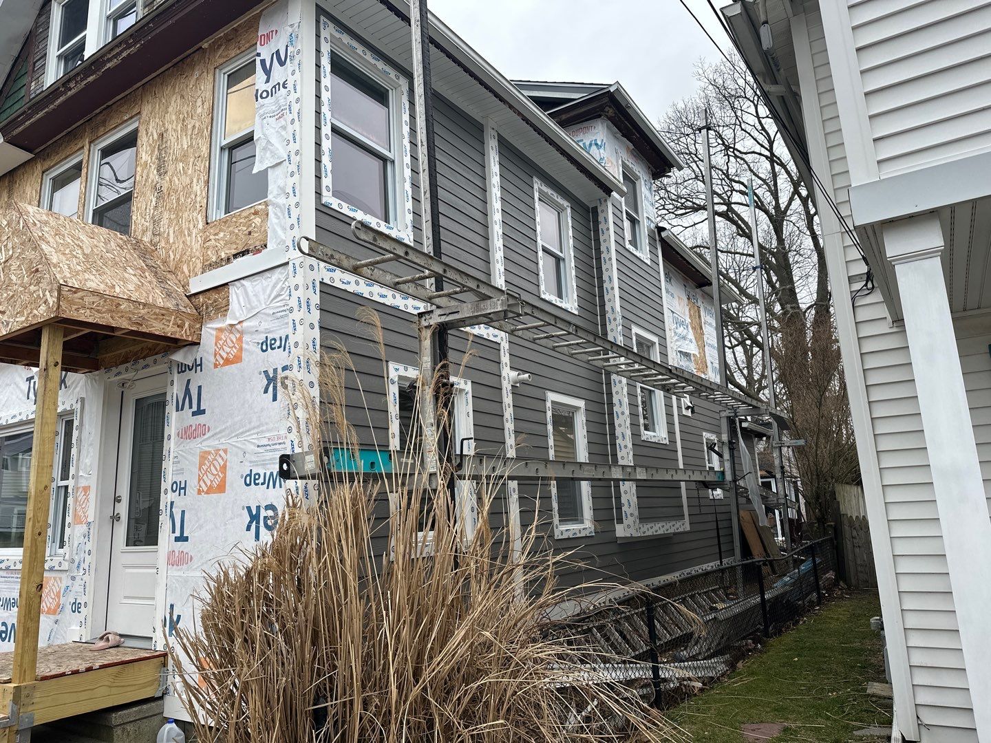 Siding Installation using Hardie Plank Aged Pewter by A Plus Exterior