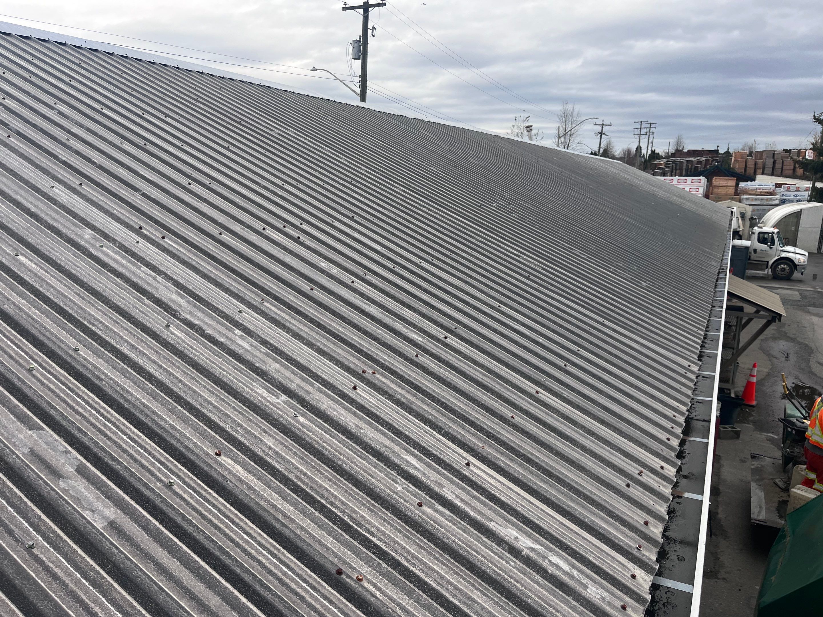 Commercial Re-Roof using Galvanized Duroclad by Top Notch Roofing Inc