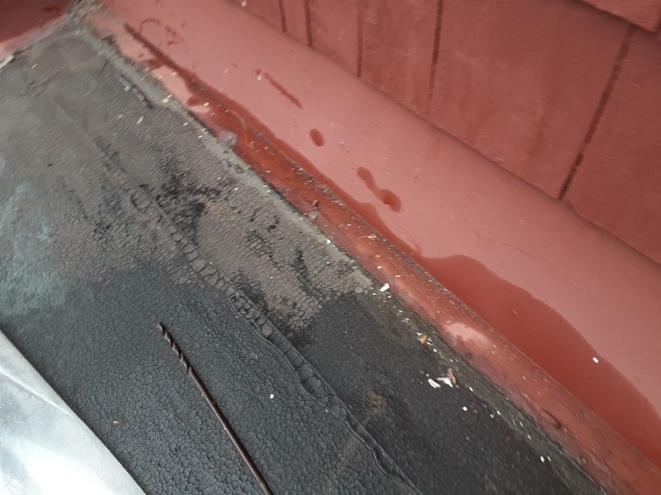 Residential Roof Replacement using Patio Roof by Absolute Roofing and Construction