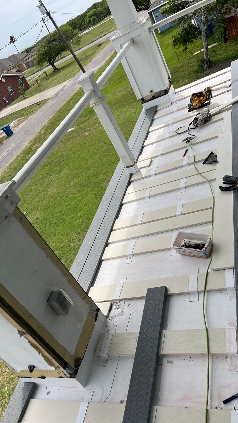 Walk Out Patio Cover by Bayfront Roofing and Construction