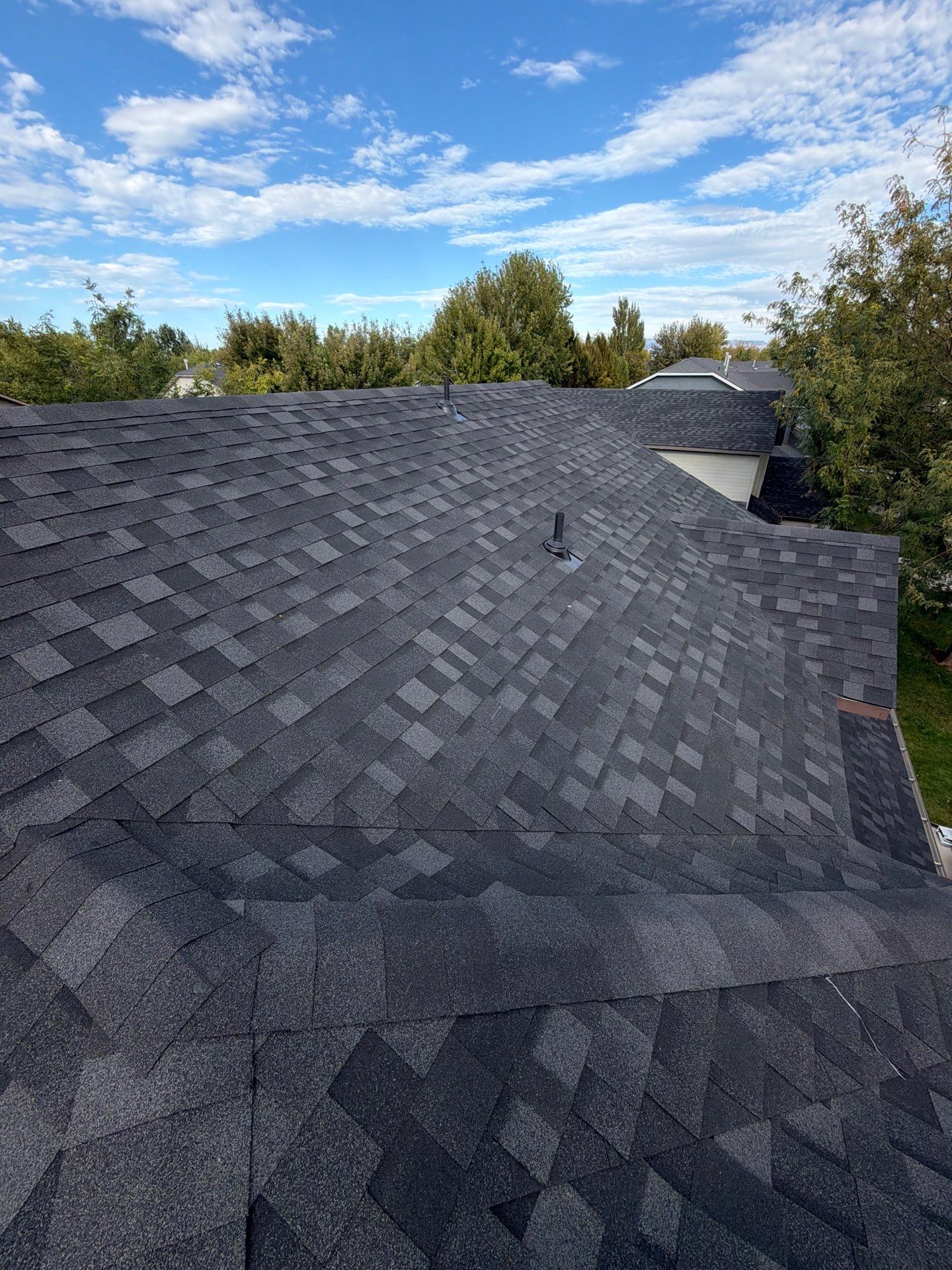 Residential Roof Replacement in Meridian Featuring Charcoal Architectural Shingles by Olive Roofing