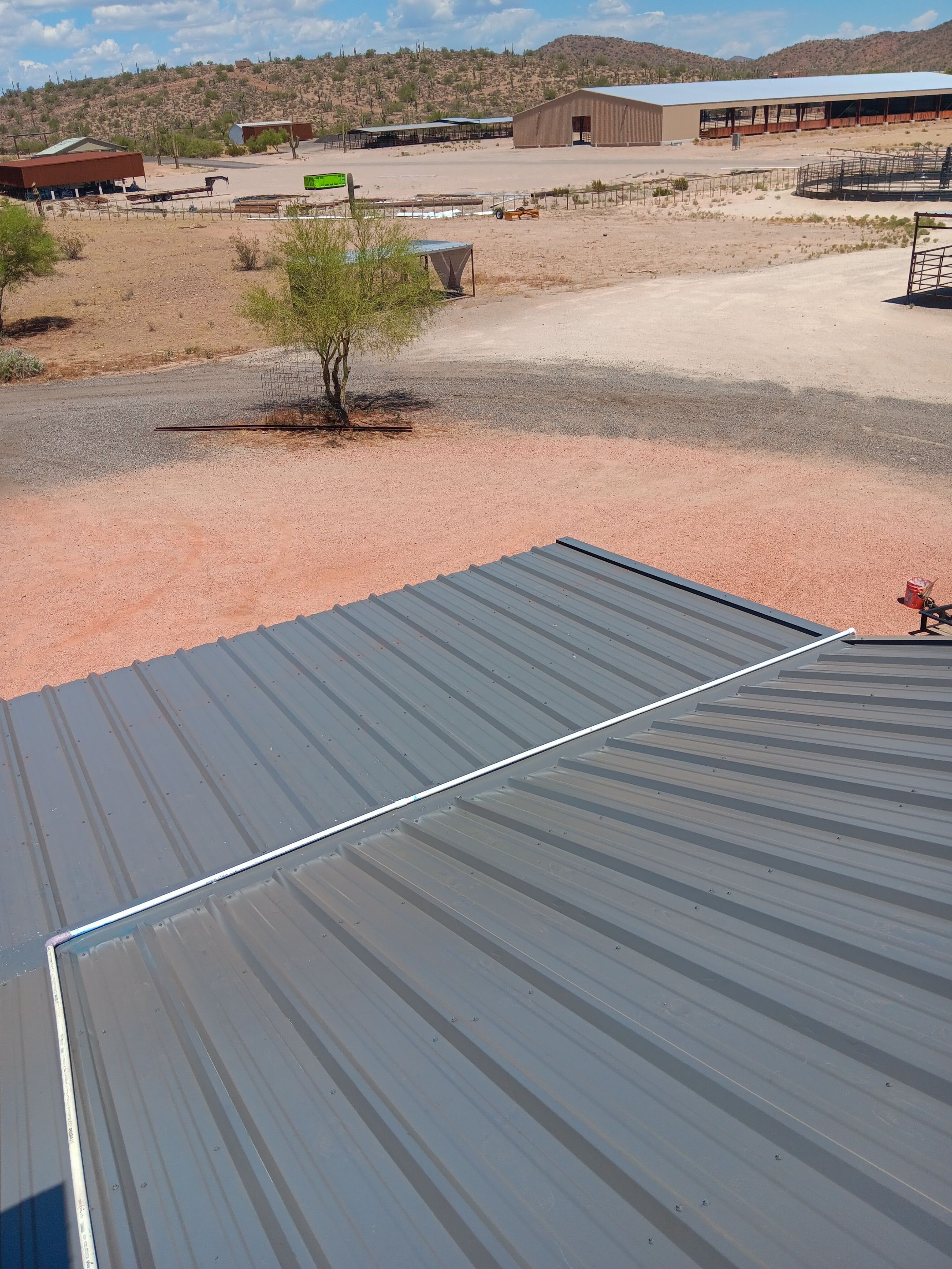 Slate Gray Exposed Fastener by Reimagine Roofing
