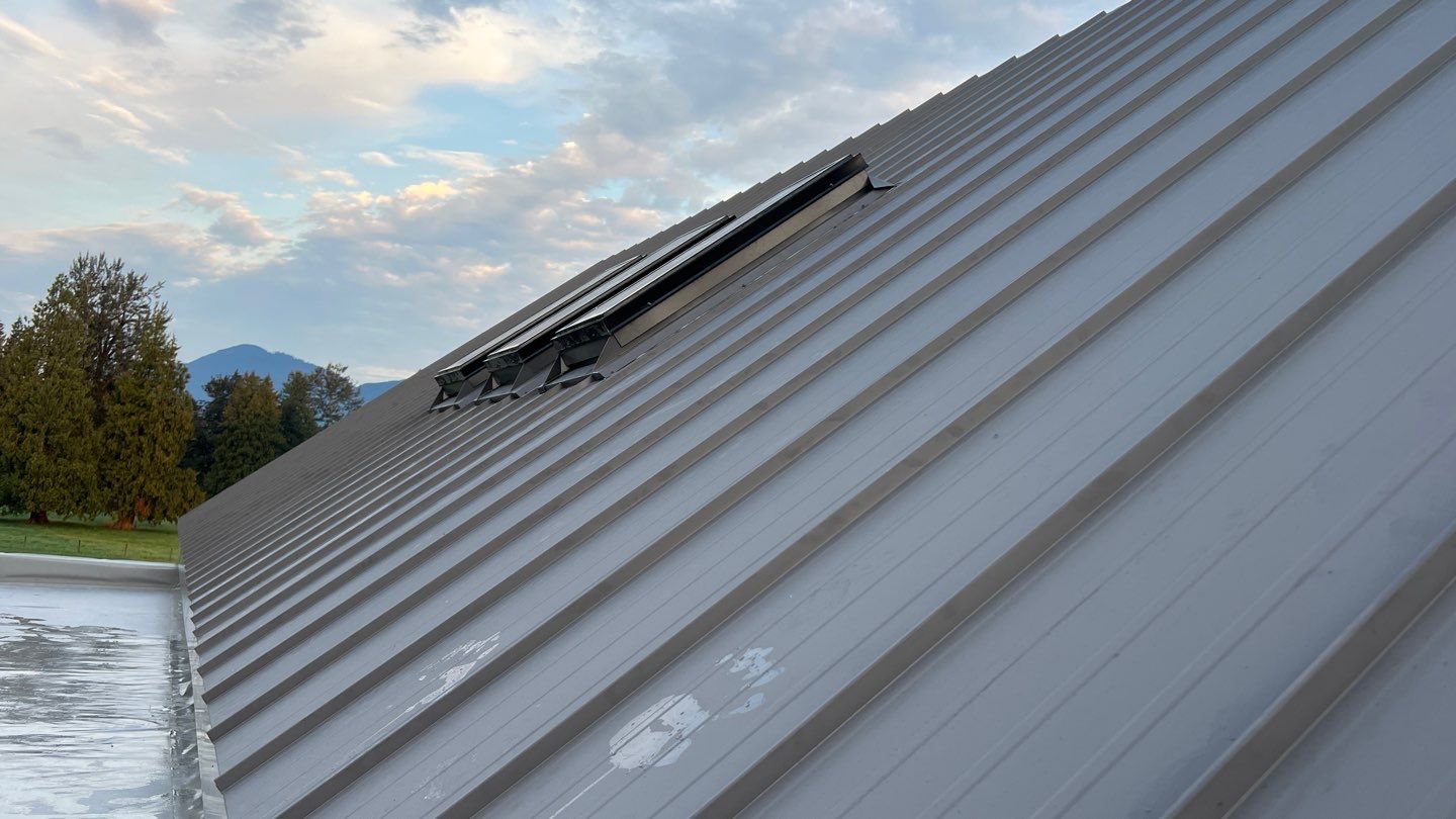 Residential Roofing Installation using multiple products by Top Notch Roofing Inc