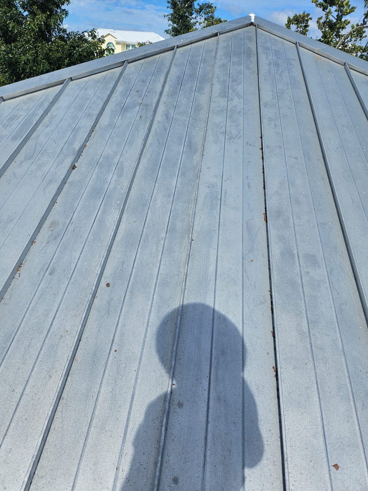 Residential Roofing Repair using Gulf Coast Metals Gulf Seam Panels by Four Peaks Roofing