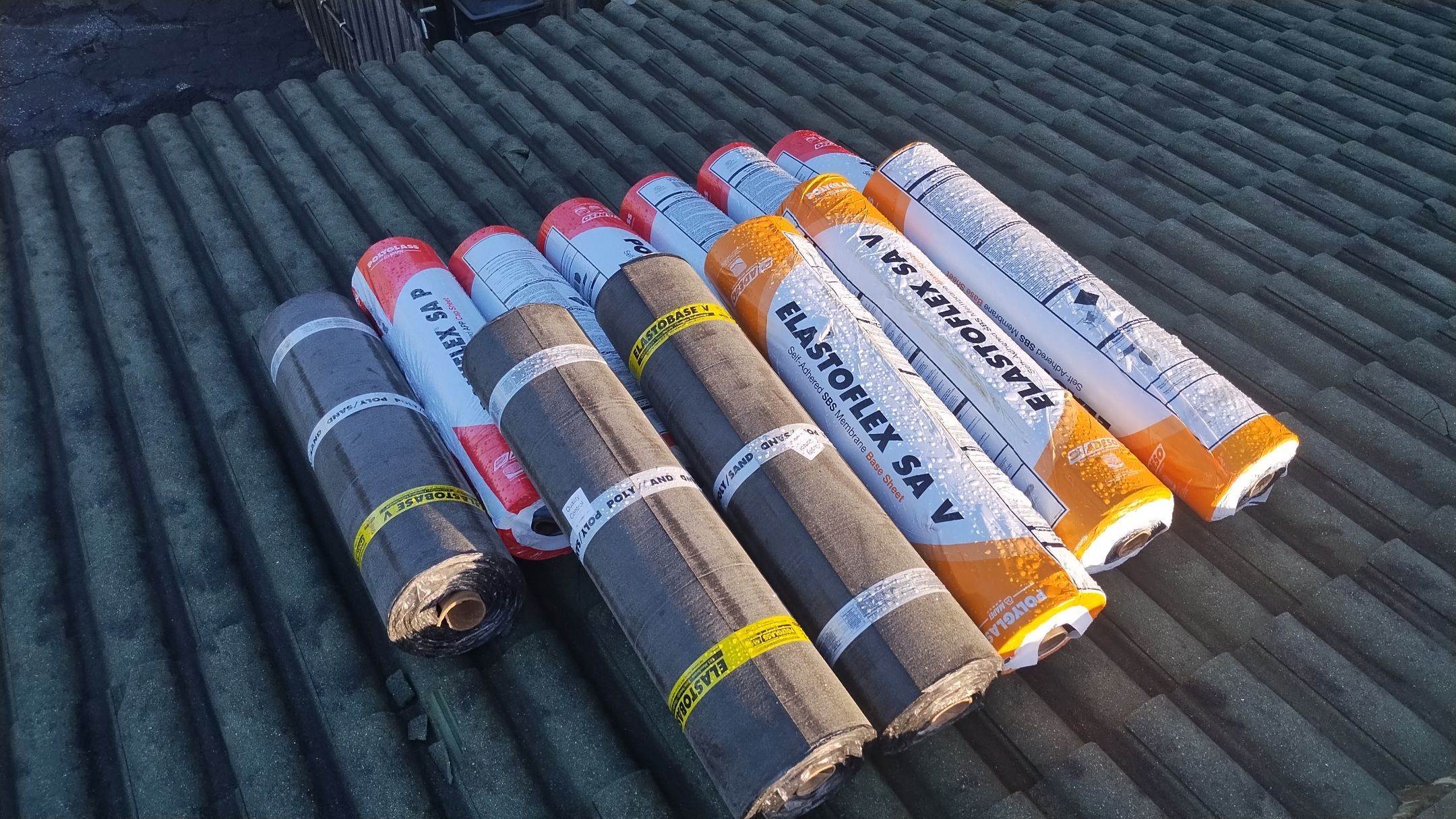 Residential Roofing Installation using 1" Nail strip metal roof by BLUES BROTHERS CONSTRUCTION CORP