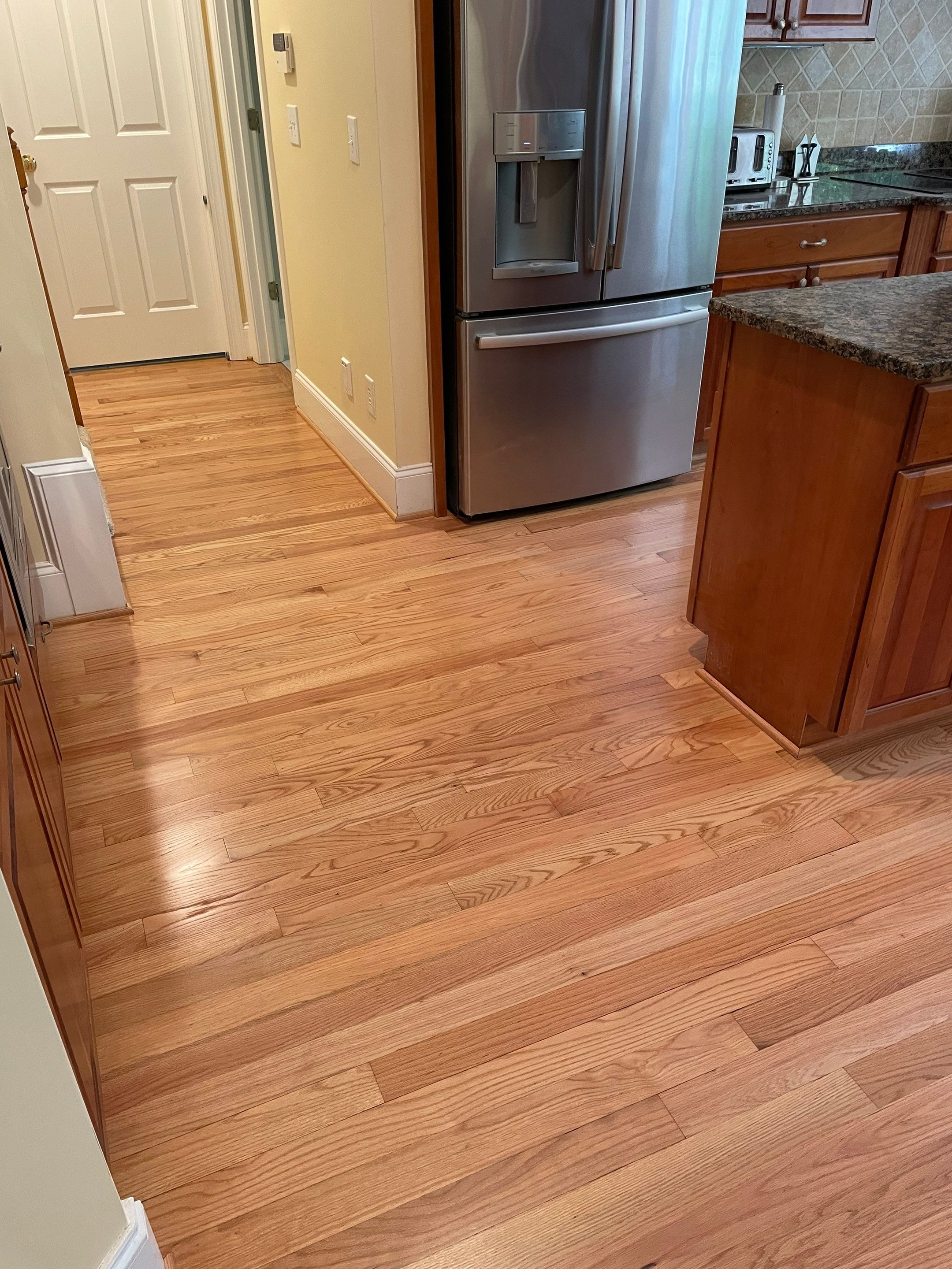 Added flooring, refinished all the floors by Accent Custom Floors
