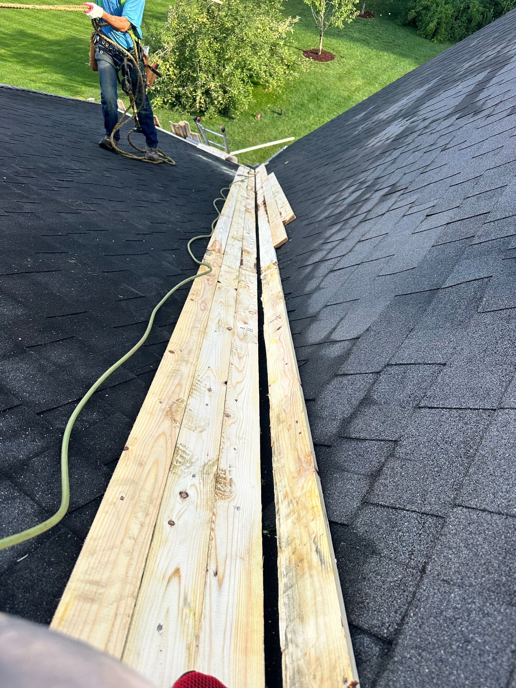 Standing seam / Azm panel in black  by Teflon Roofing