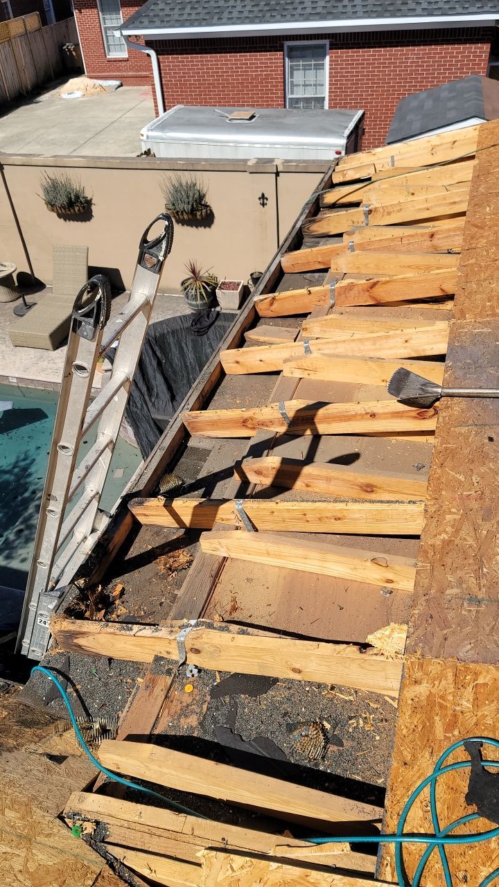 Residential Roofing Installation using Roof Replacement by American Roofing & Construction LLC